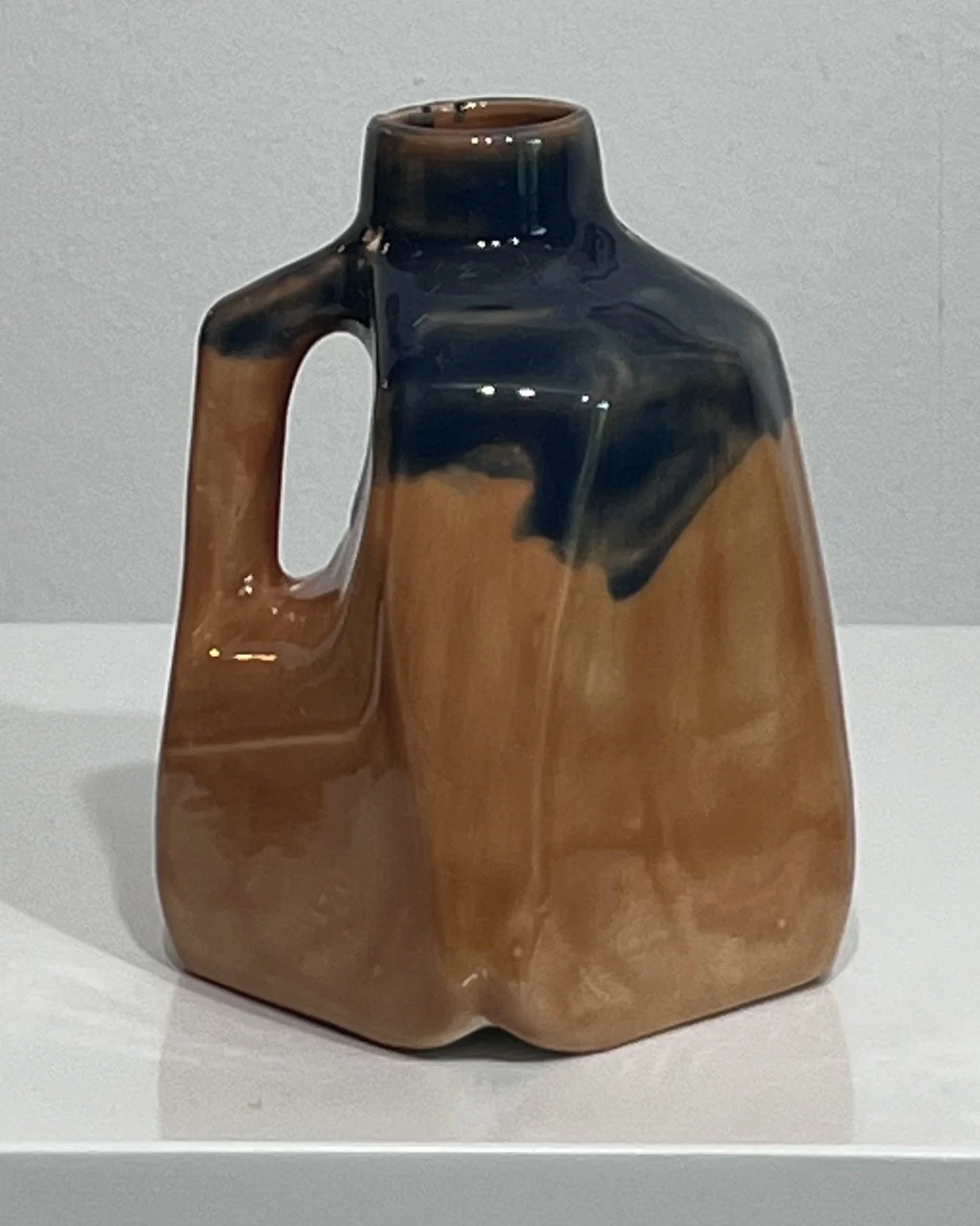 Back view of handmade Sandalwood and Deep Sea ceramic milk jug vase