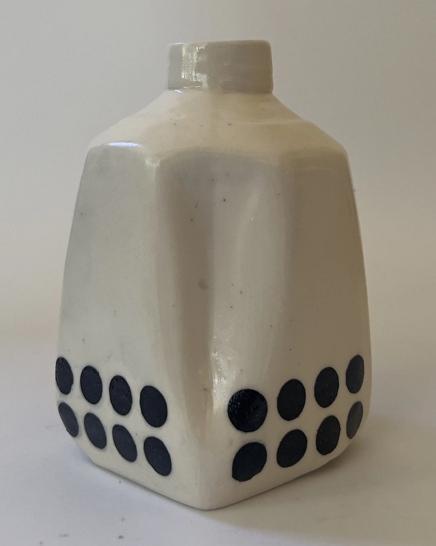 Back view of handbuilt ceramic milk jug sculpture