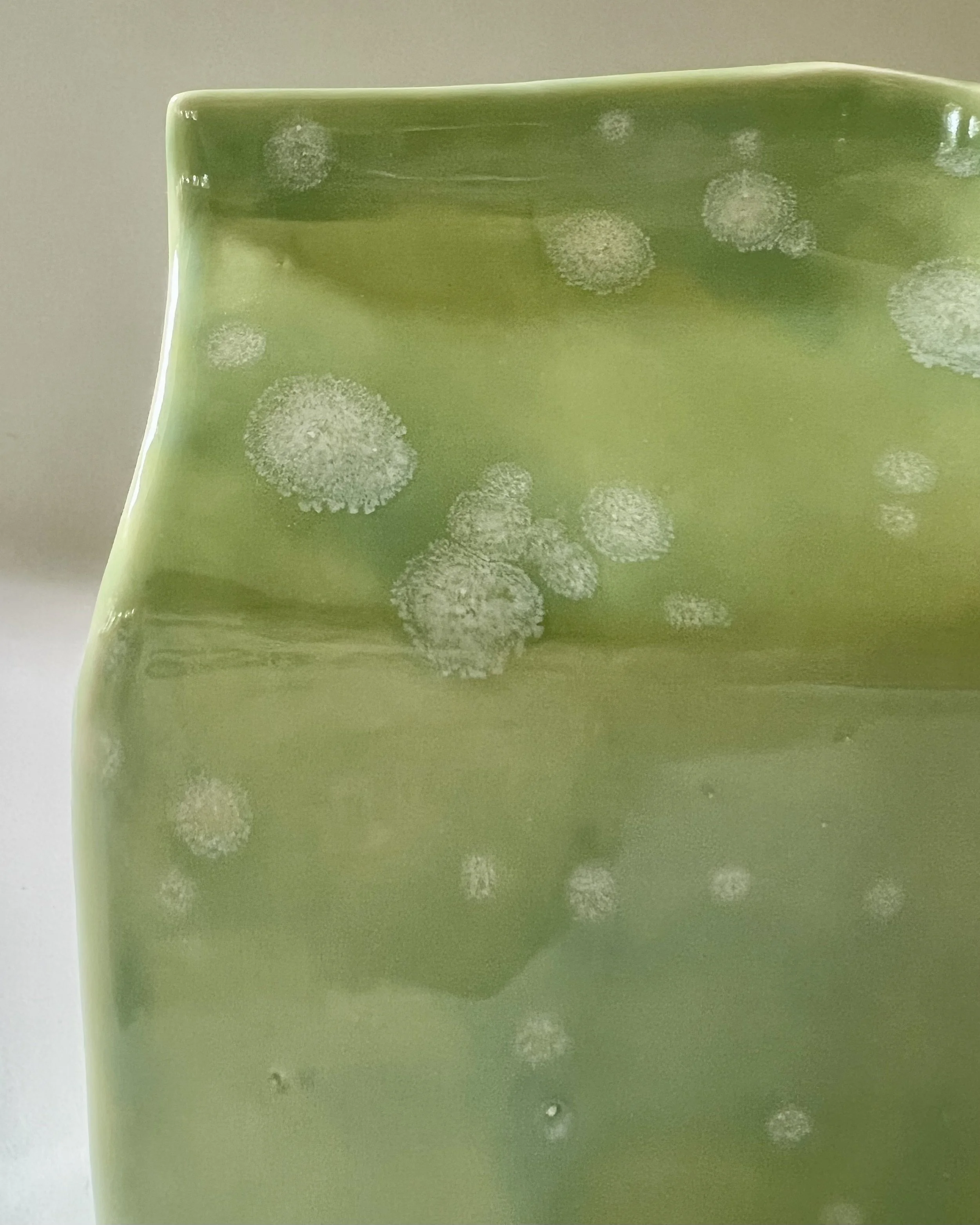 Close-up detail of Celadon Bloom over Saguaro glaze with crystalline texture and soft green variations.