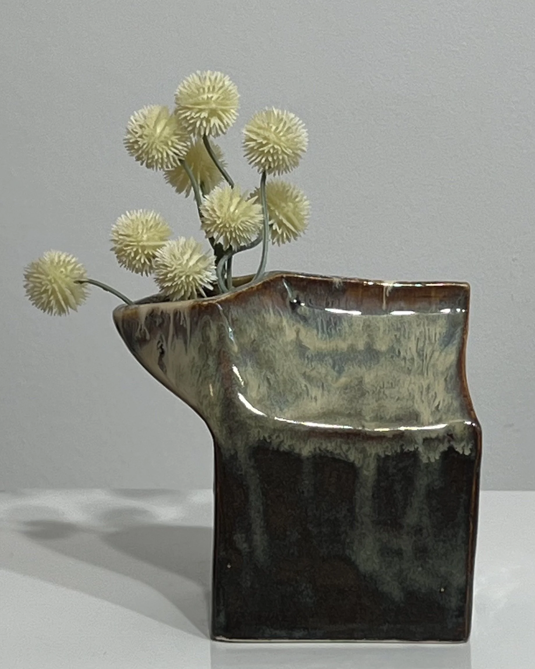 Iron Lustre and Light Flux porcelain milk carton vase with cream flowers by Alissa Van Atta