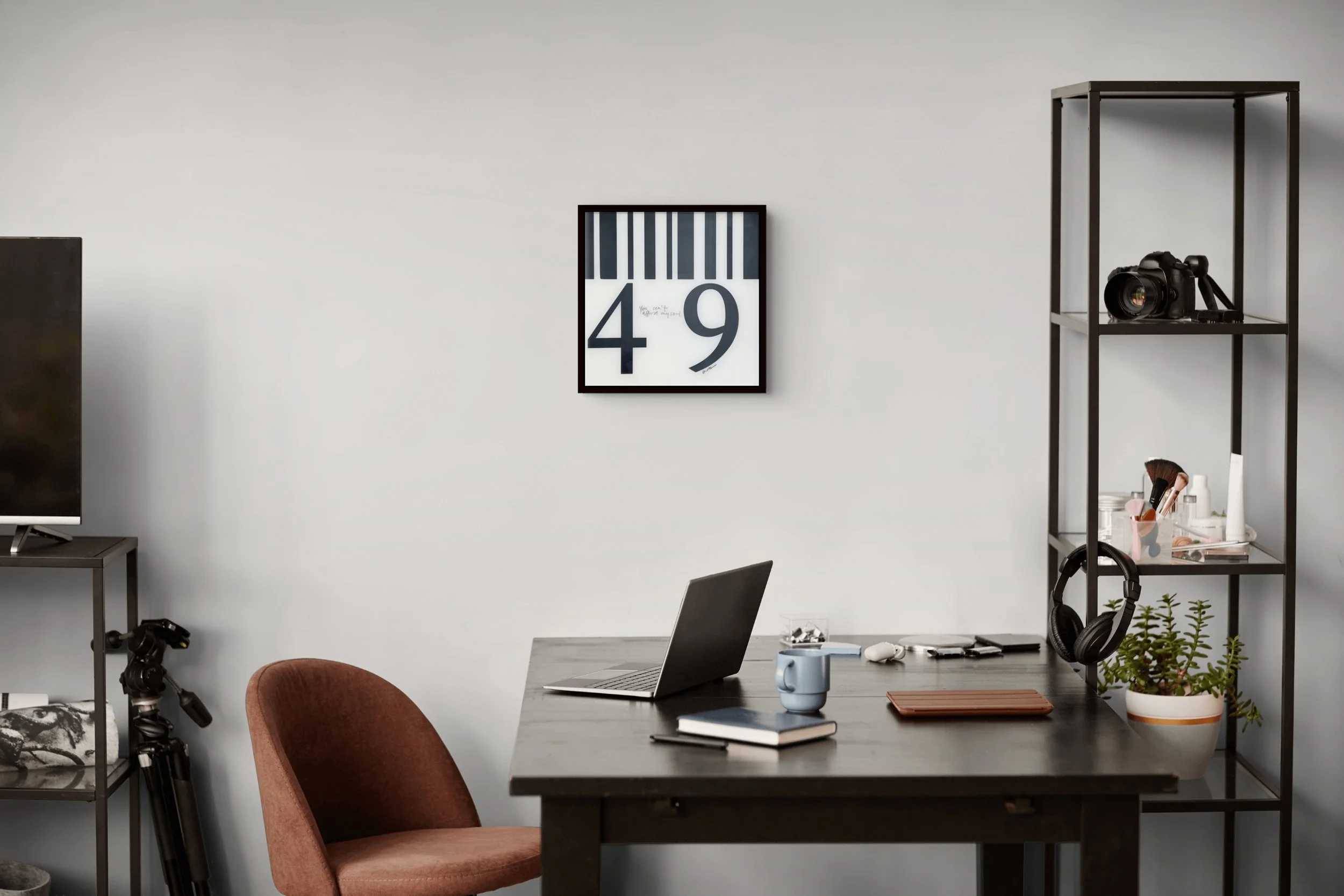 You Can't Afford My Soul, original contemporary feminist barcode artwork by Alissa Van Atta, displayed above a desk in a minimalist home office.