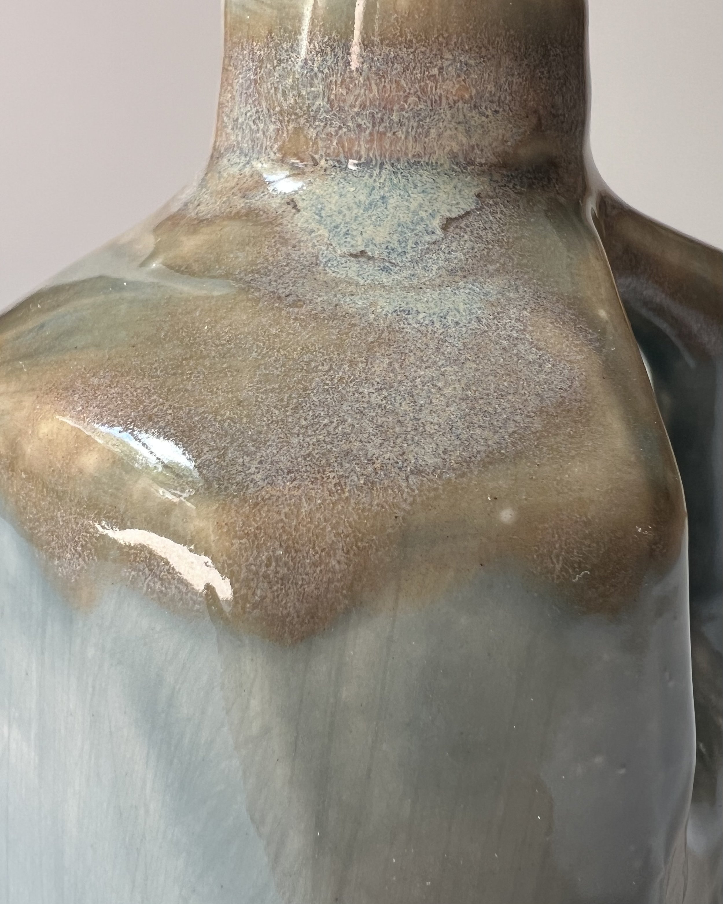 Close-up of layered White Satin Matte and Mystic Tide glazes highlighting the handcrafted ceramic surface.