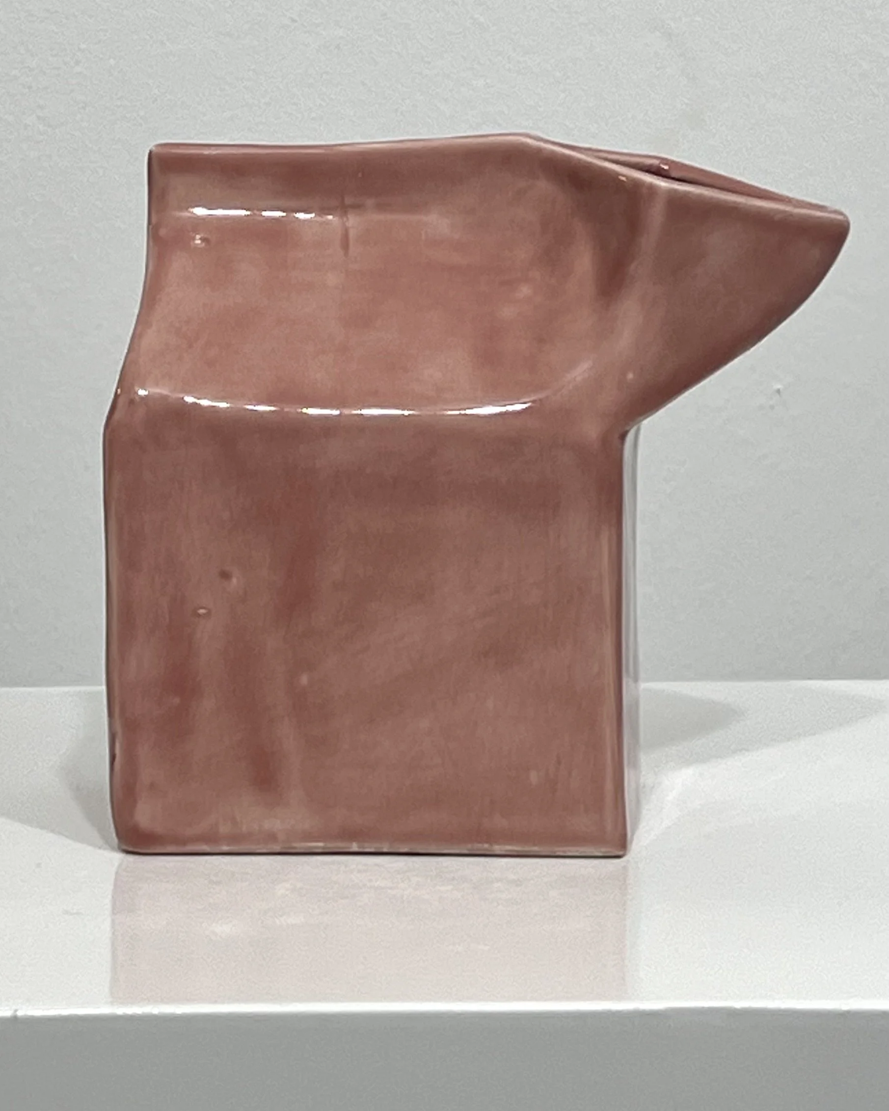 Side view of Milk Carton 26.5 porcelain sculpture highlighting the angled spout and contemporary milk carton silhouette.