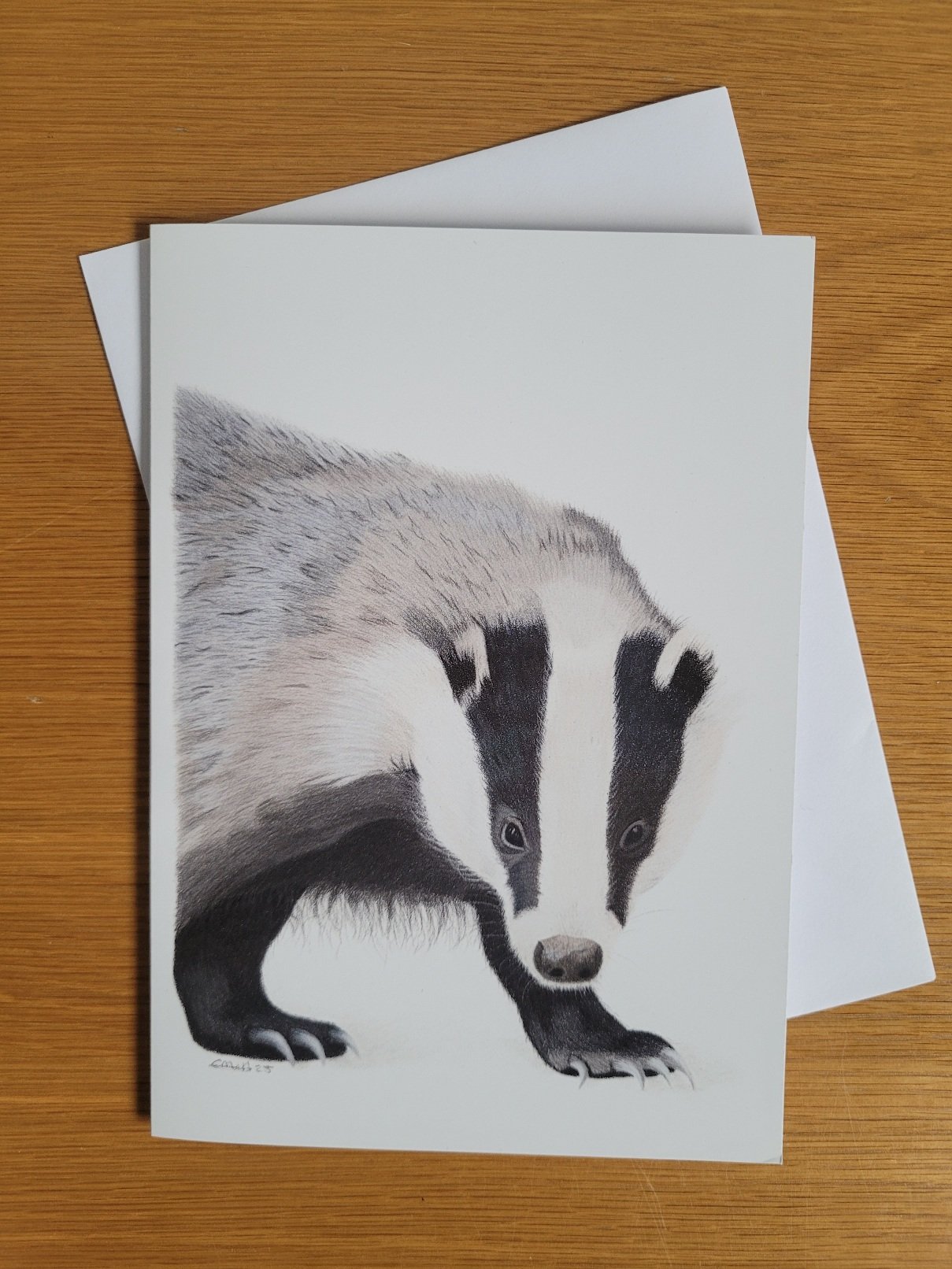 A card featuring a badger drawing.