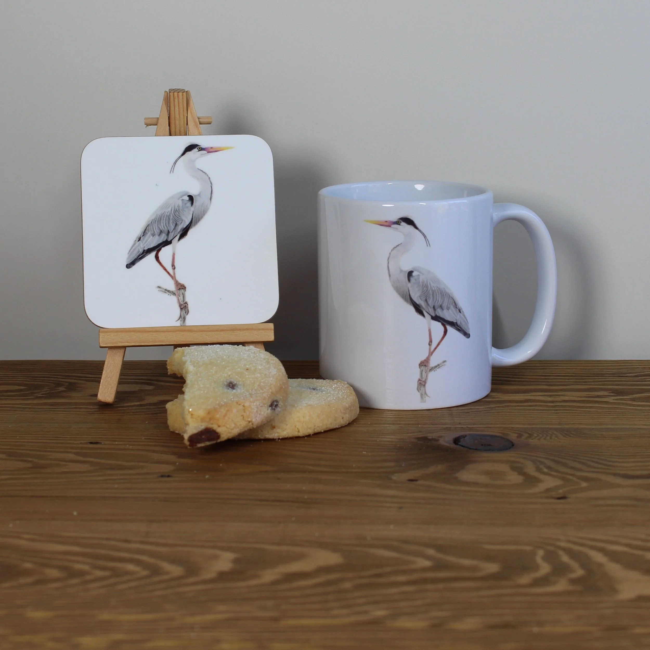 Individual glossy heron coaster with matching mug.