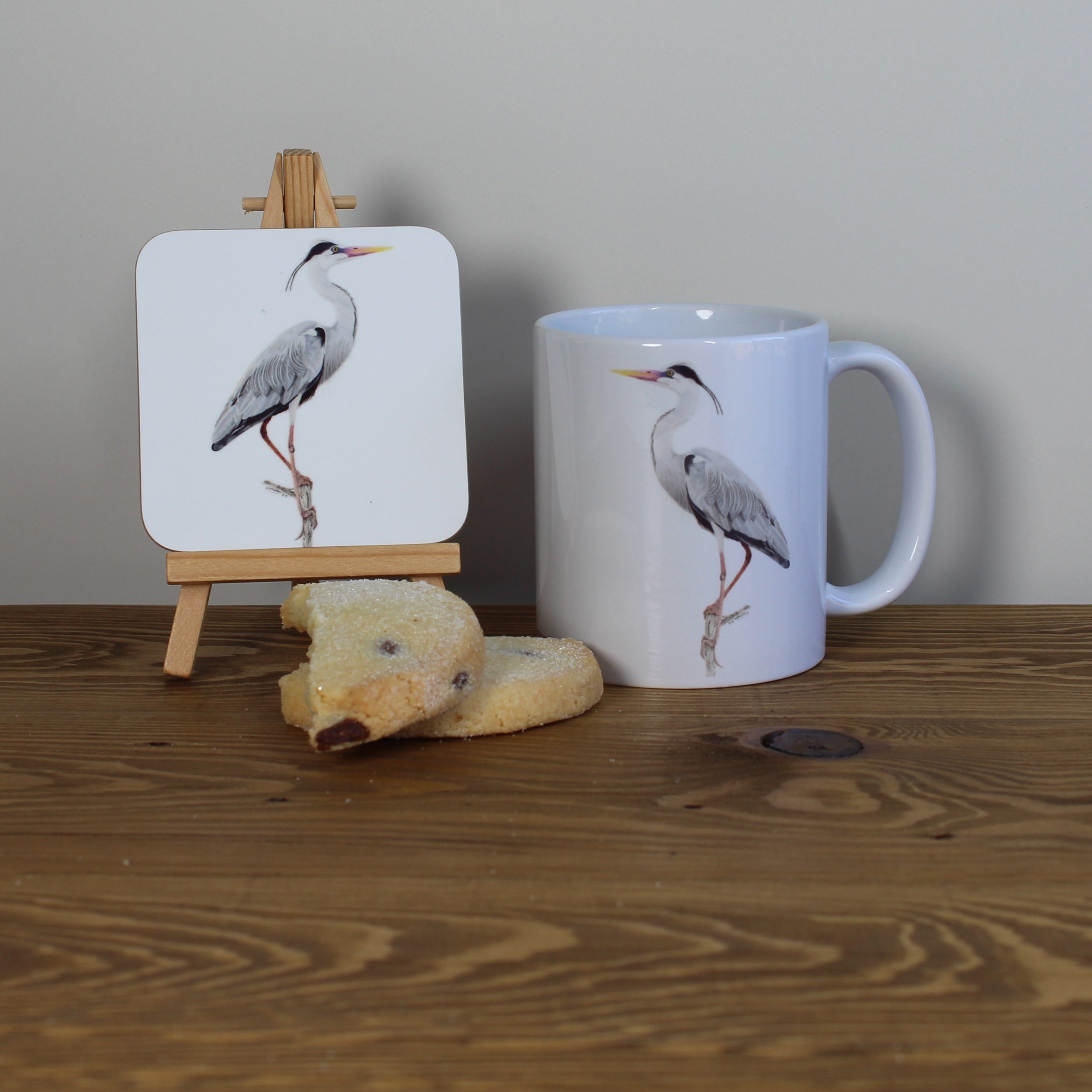 Heron white 11oz ceramic mug and matching coaster.