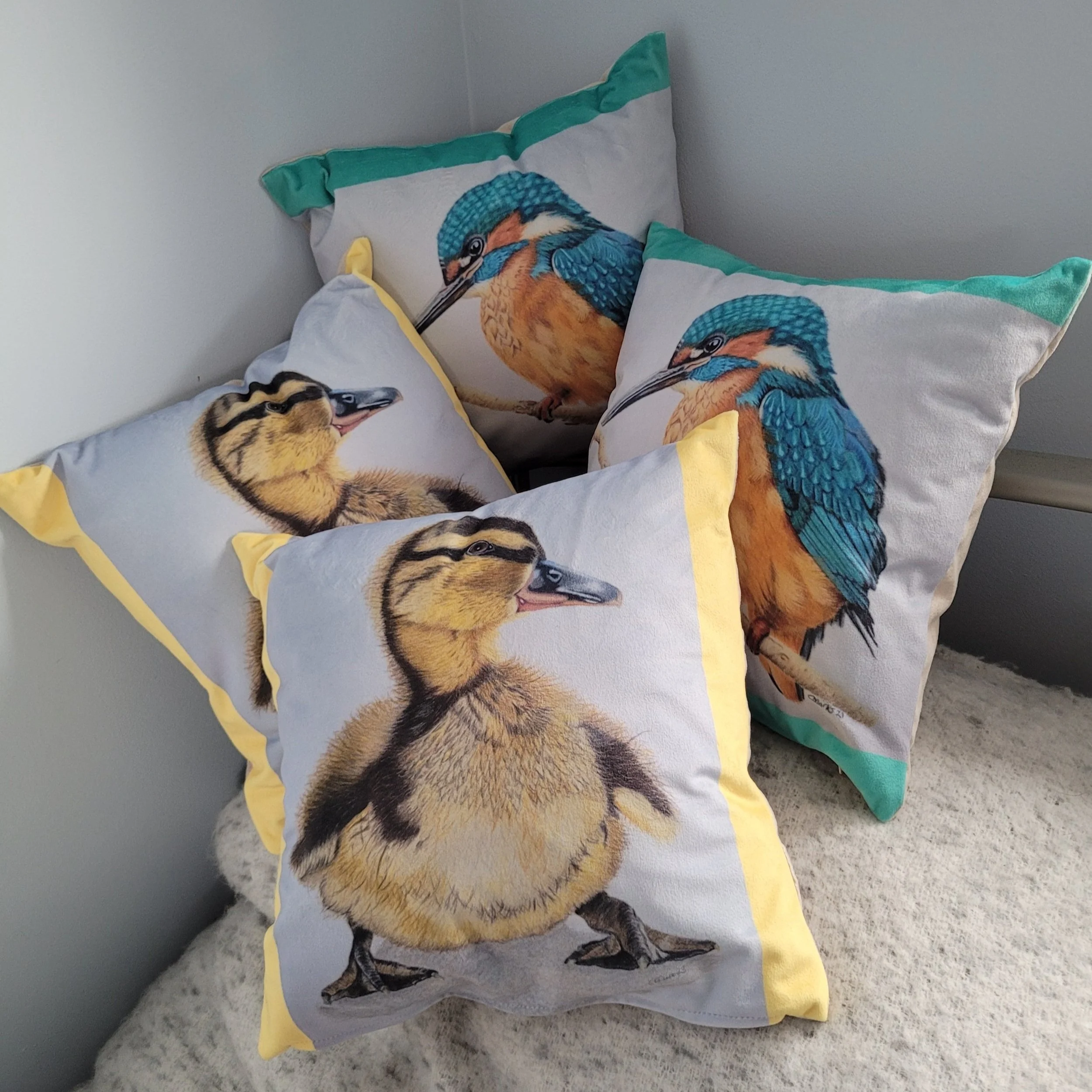Kingfisher and duckling soft cushions.