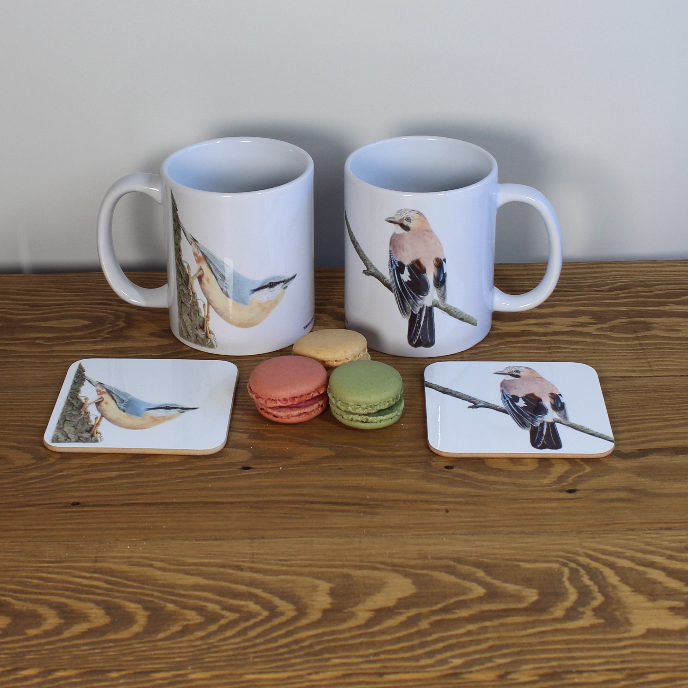 Jay and nuthatch white 11oz ceramic mugs and matching coasters.