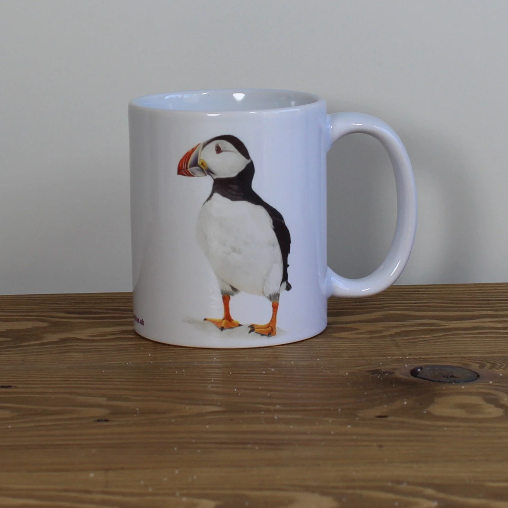 Puffin white 11oz ceramic mug.
