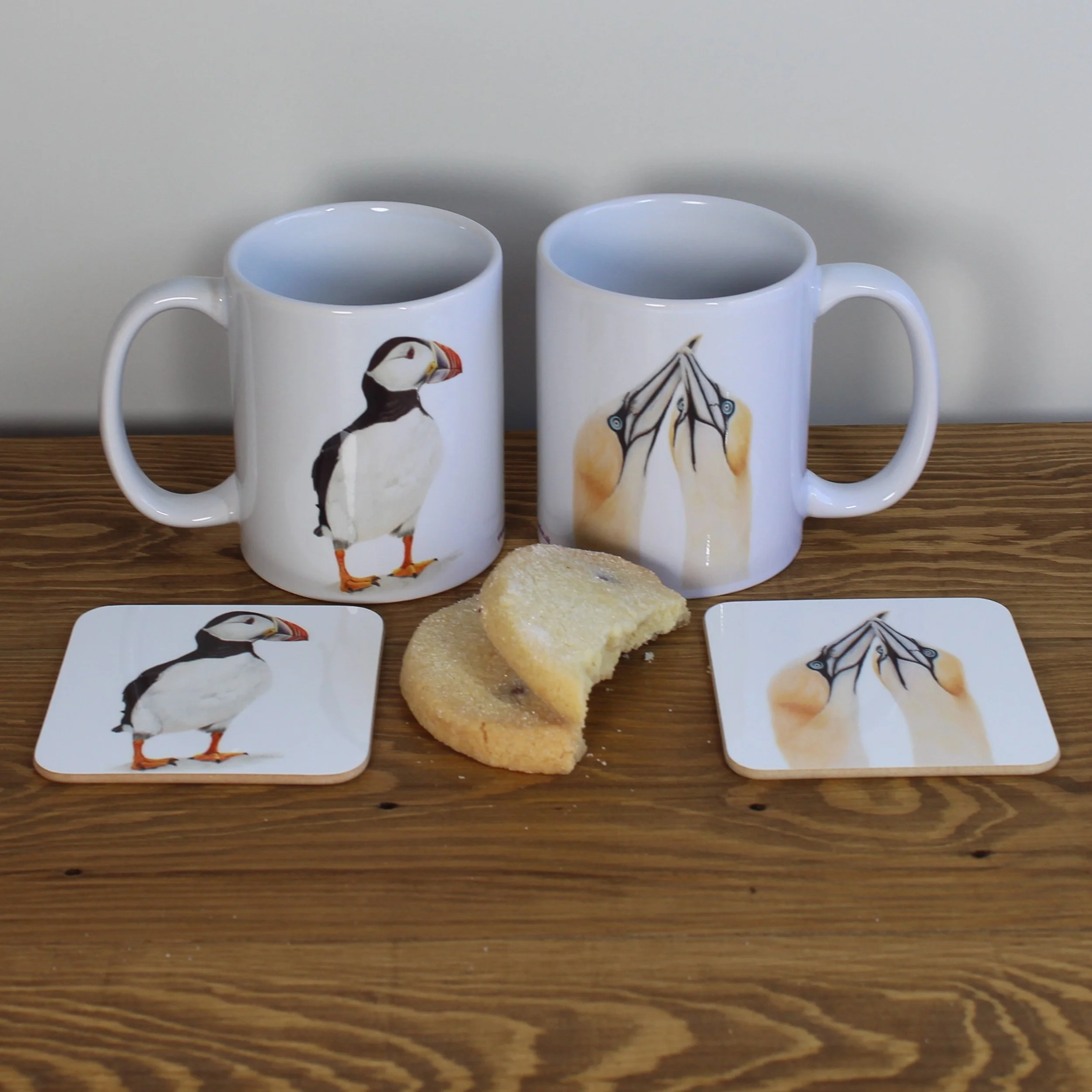 Individual glossy puffin and gannets coasters and matching mugs..