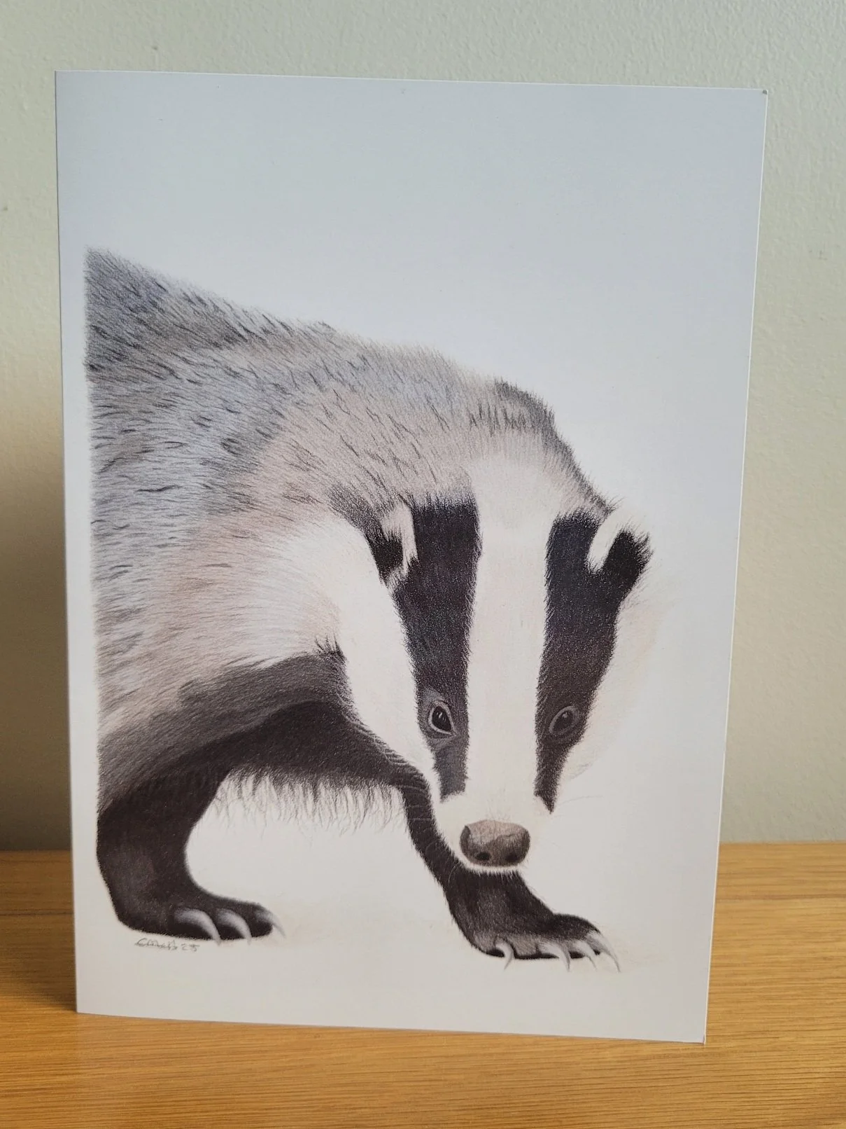 A card featuring a badger drawing.