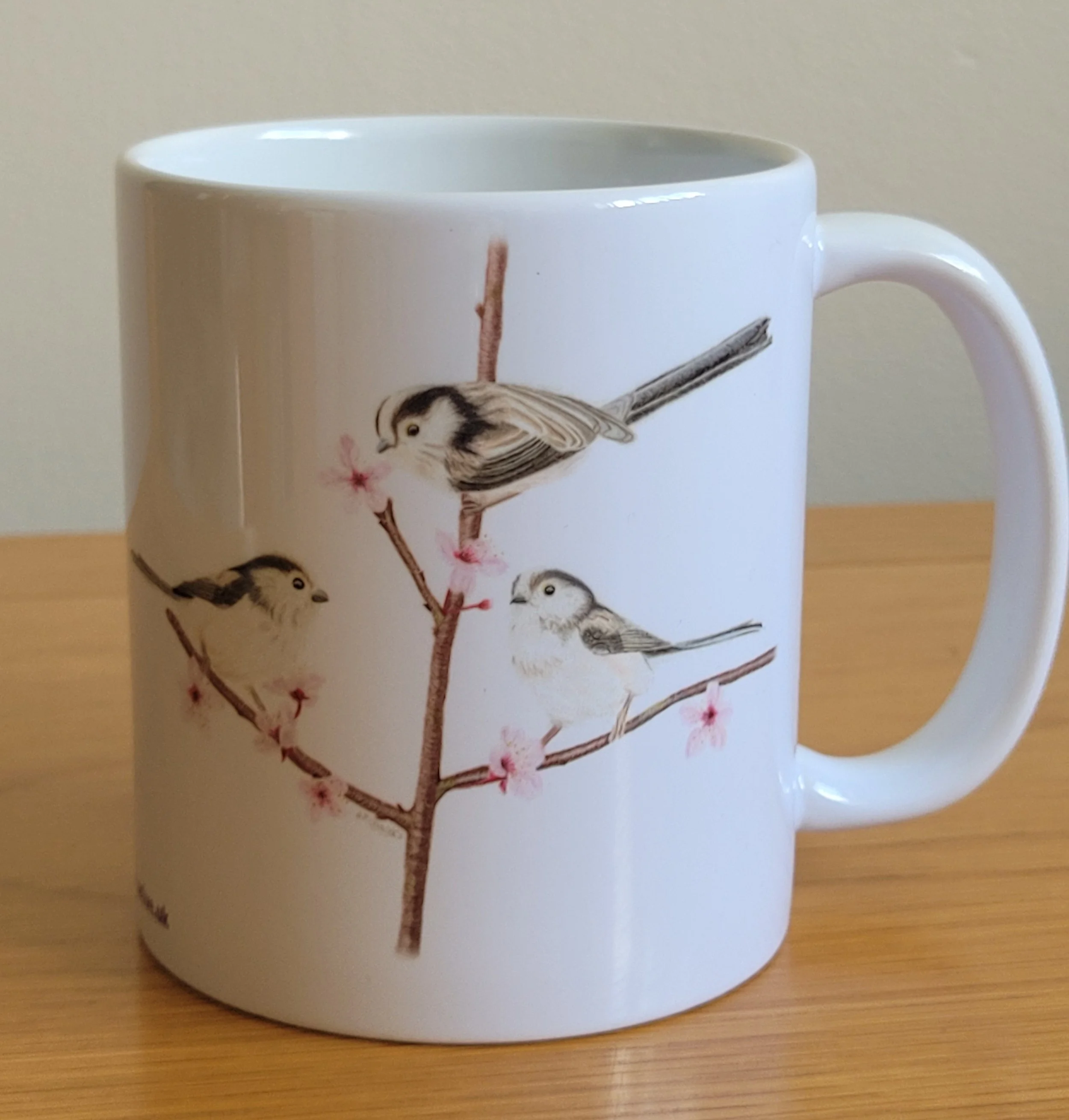 Long tailed tits white 11oz ceramic mug
