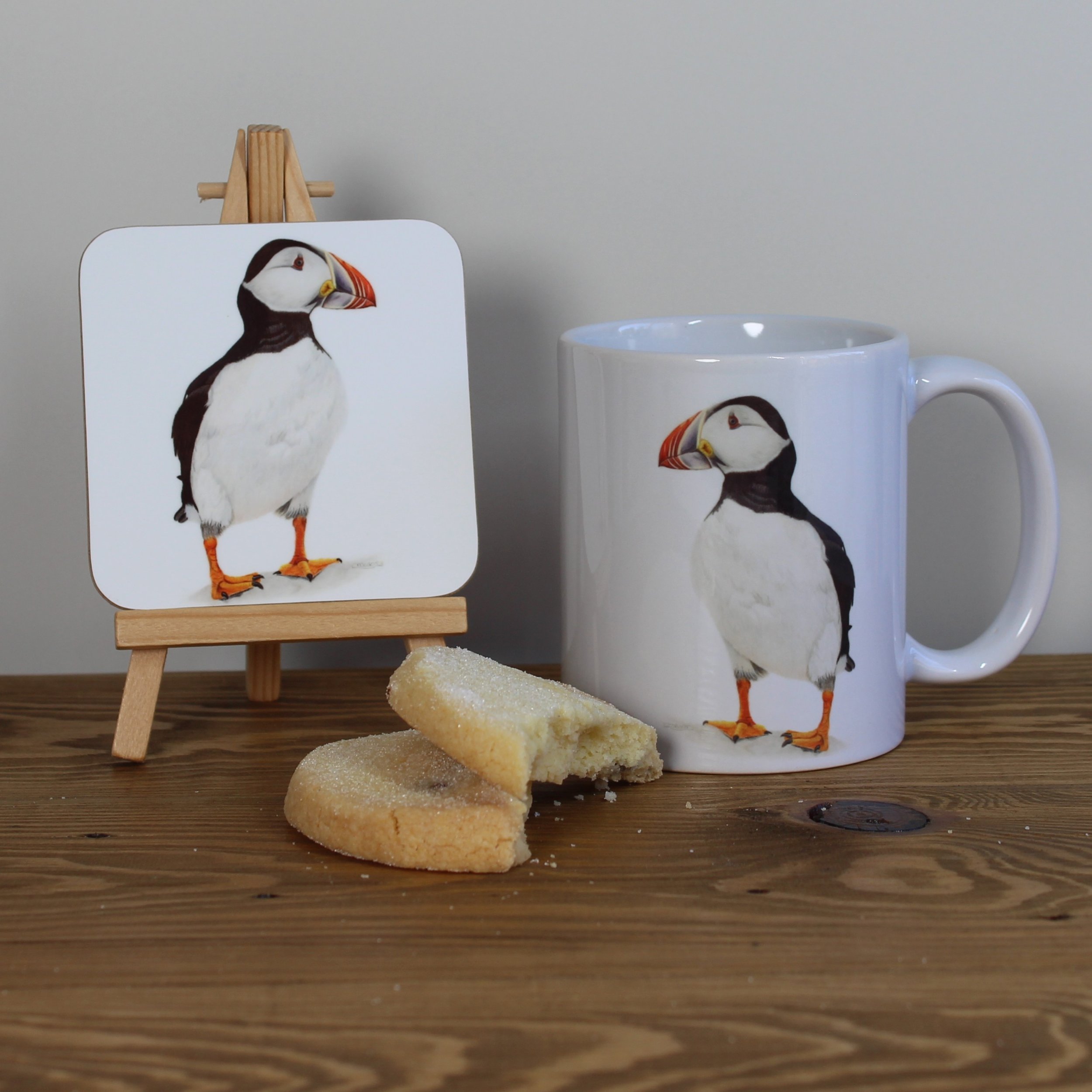 Individual glossy puffin coaster and matching mug.