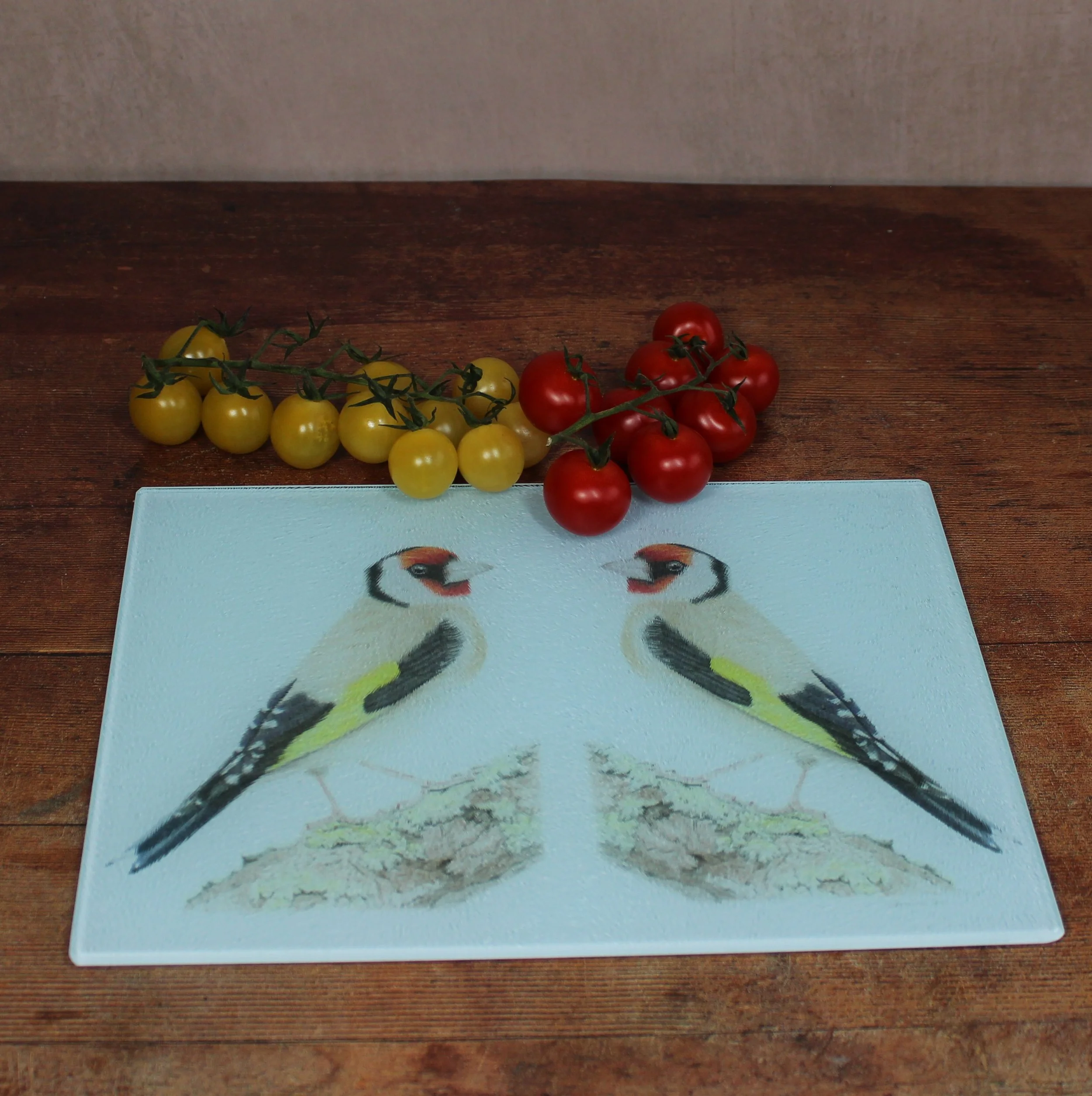 Goldfinch small glass chopping board / worktop saver.