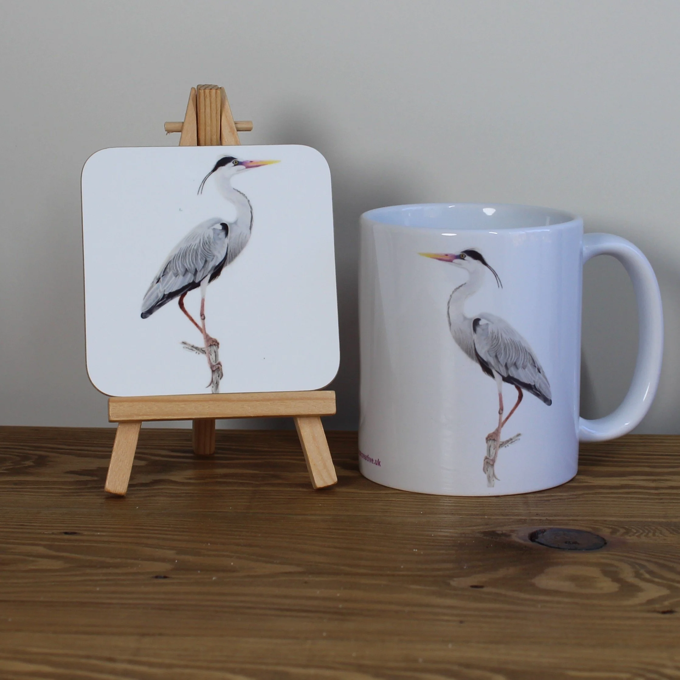 Heron white 11oz ceramic mug and matching coaster.