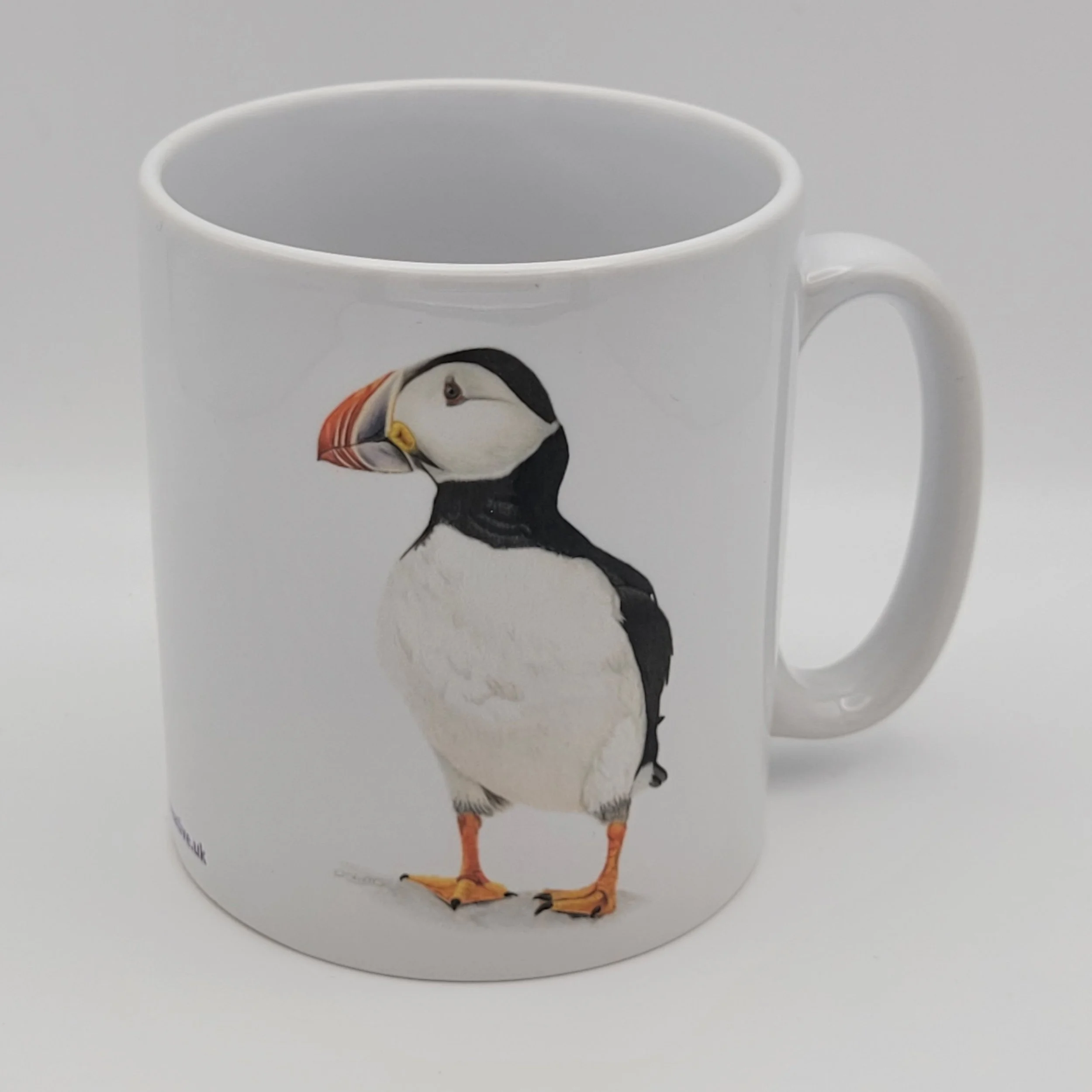 Puffin white ceramic 11oz mug.