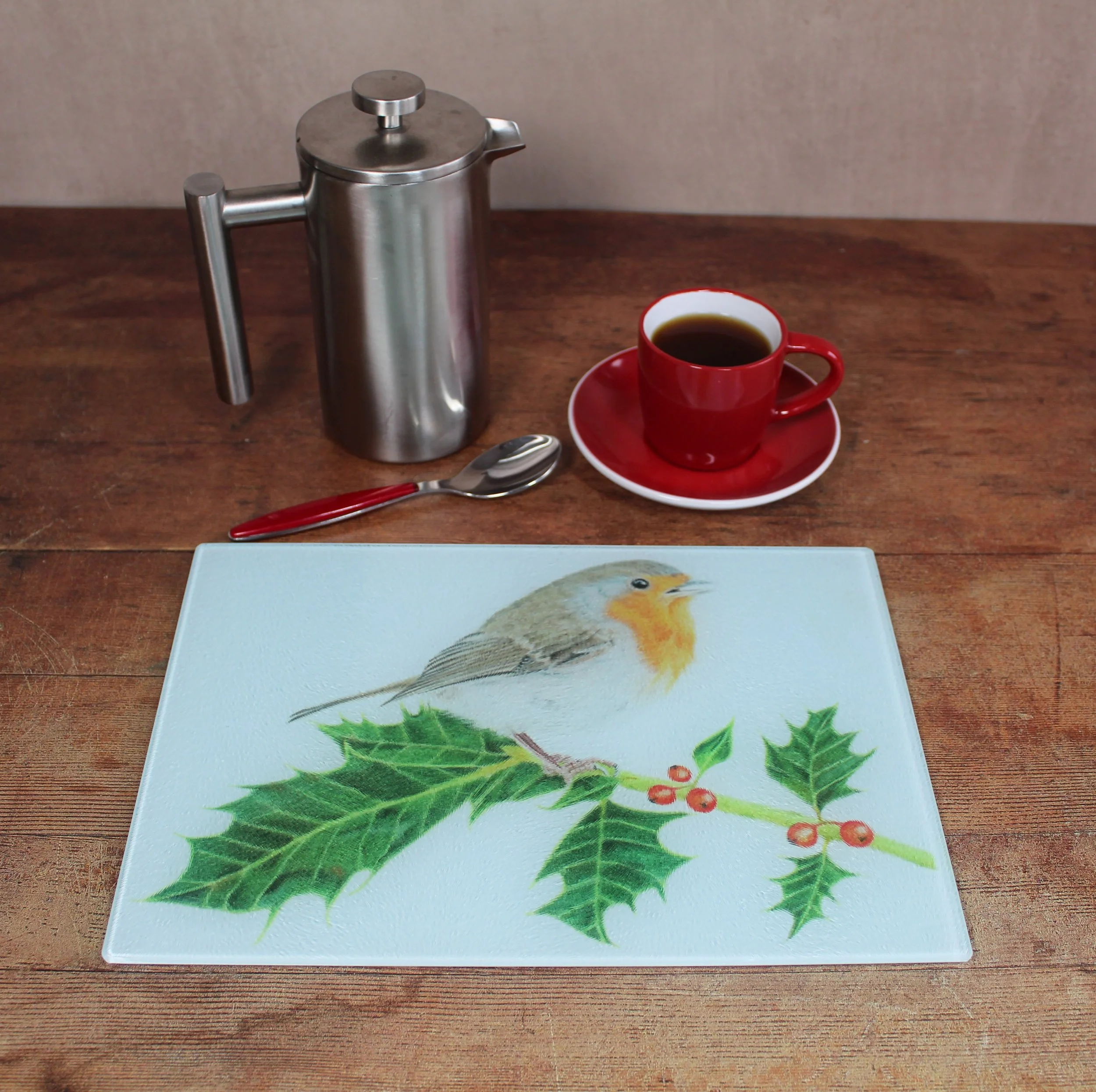Robin on holly small glass chopping board / worktop saver.