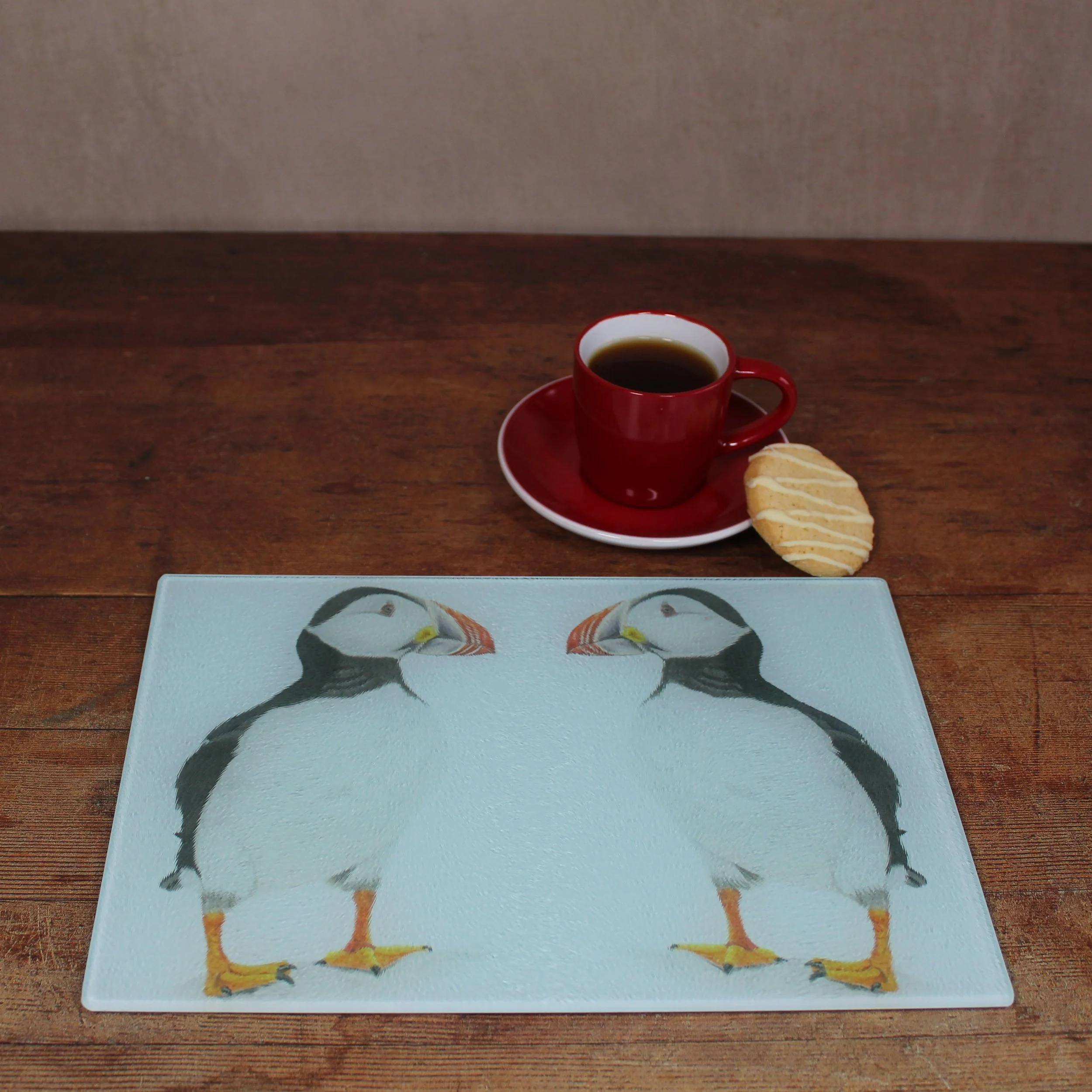 Puffin small glass chopping board / worktop saver.