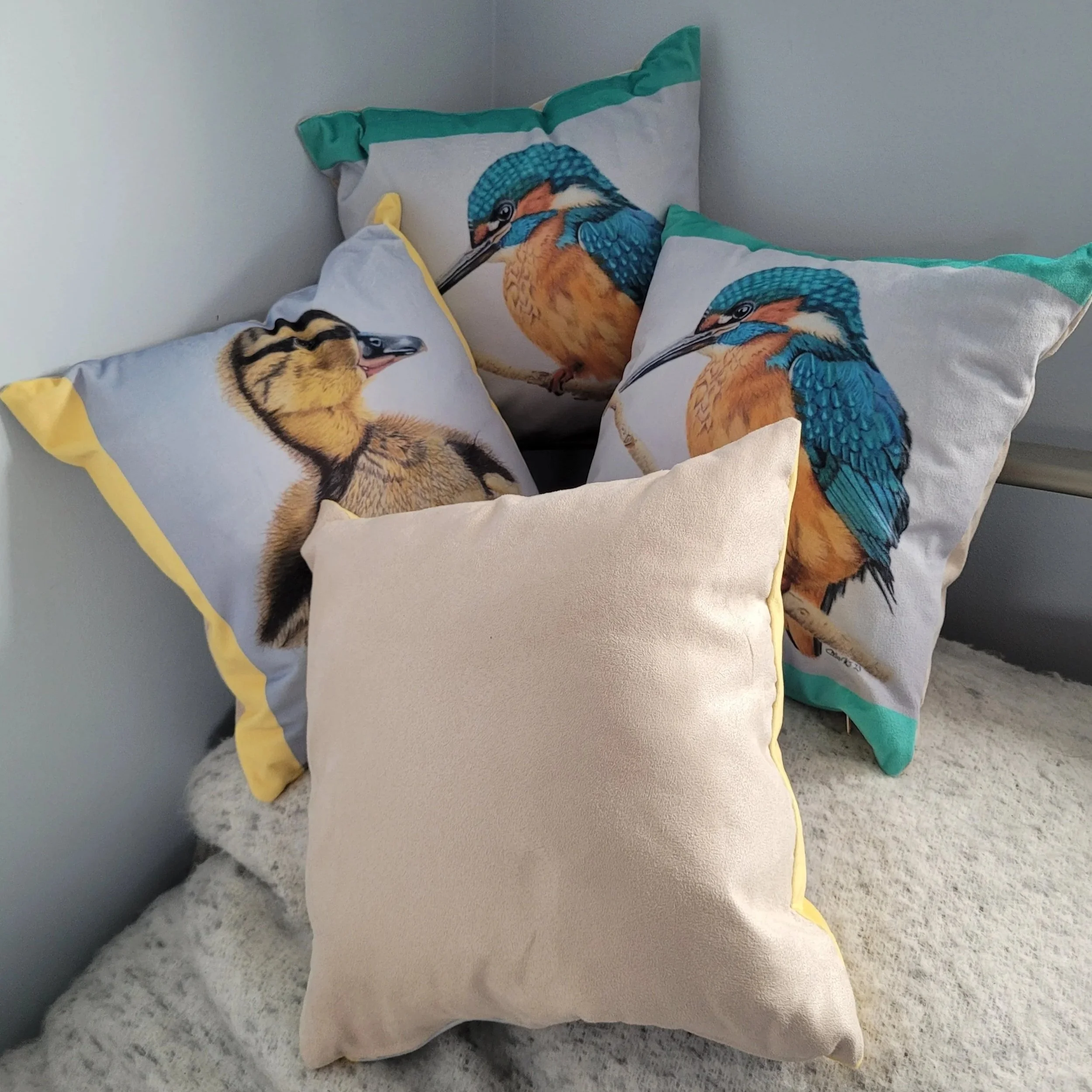 Kingfisher and duckling soft cushions.