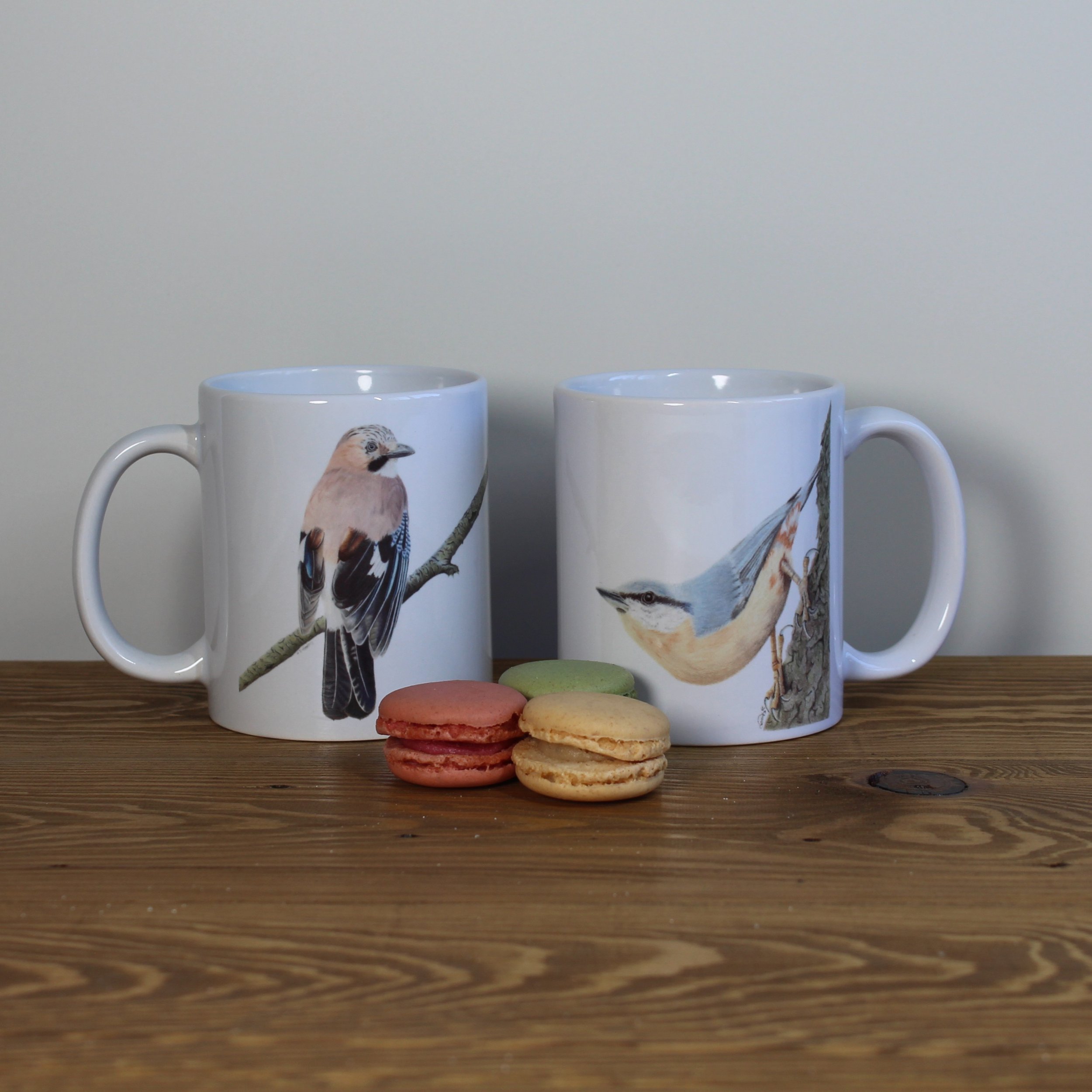 Jay and nuthatch white 11oz ceramic mugs.