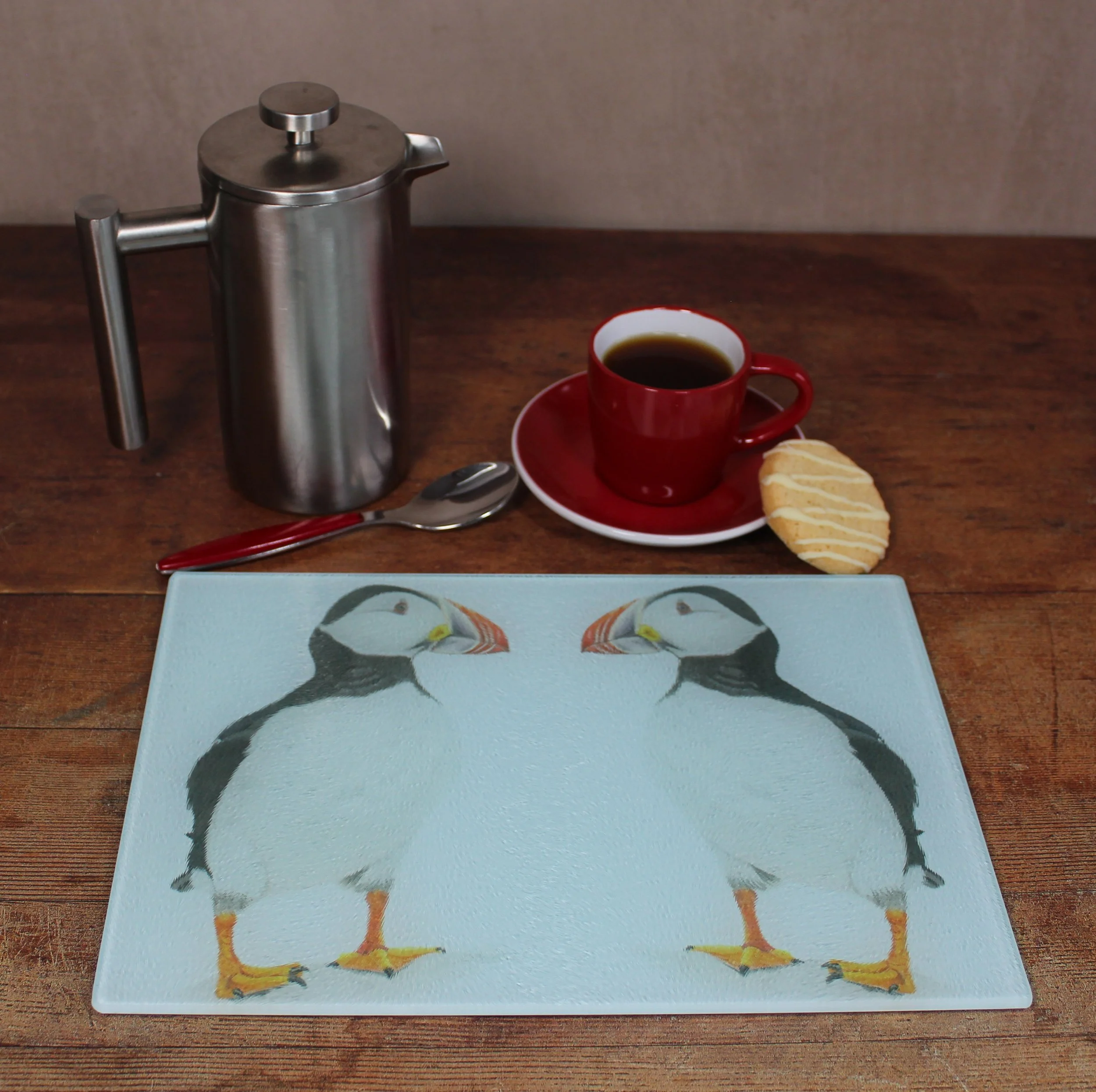 Puffin small glass chopping board / worktop saver.