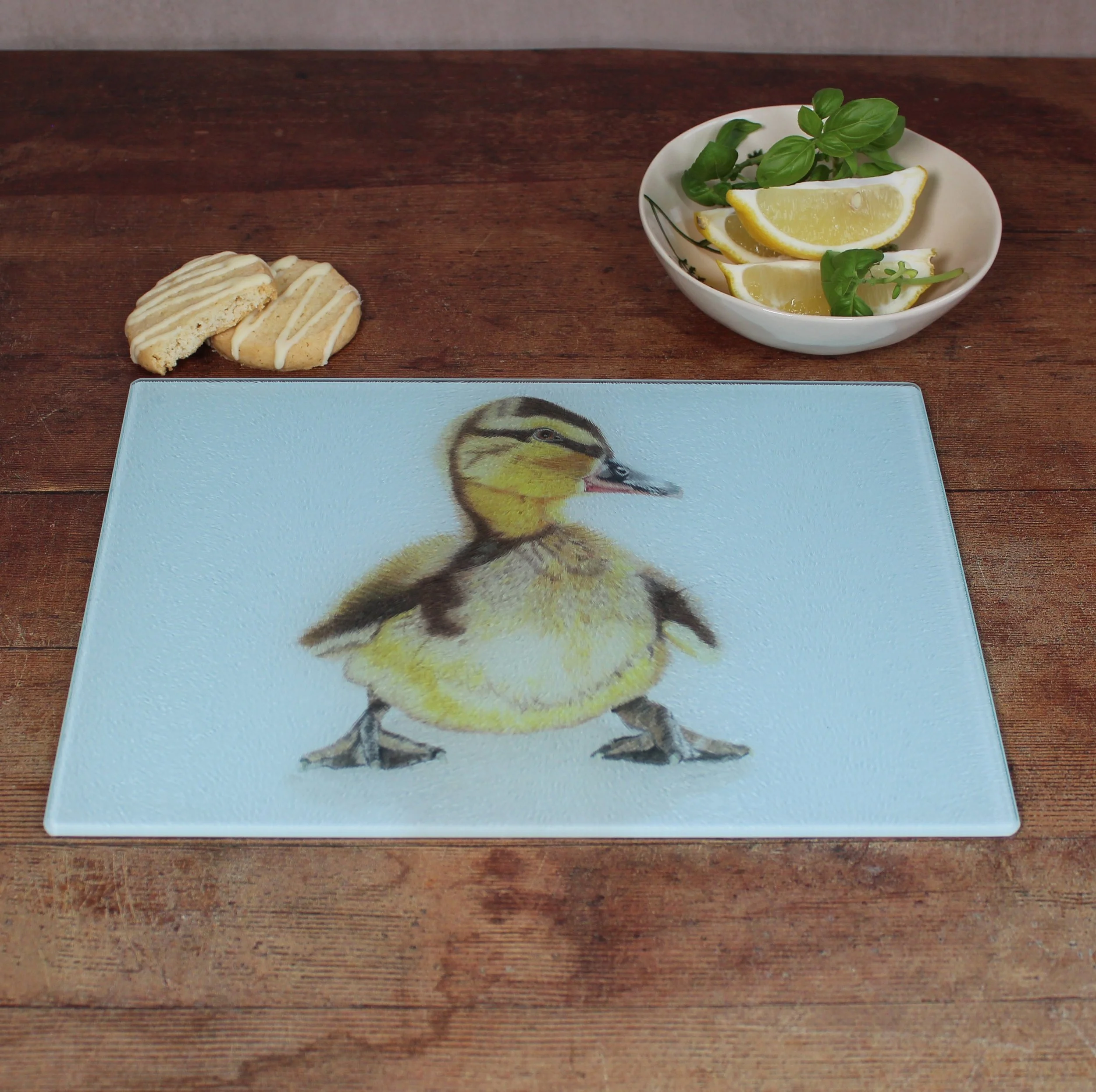Duckling small glass chopping board / worktop saver