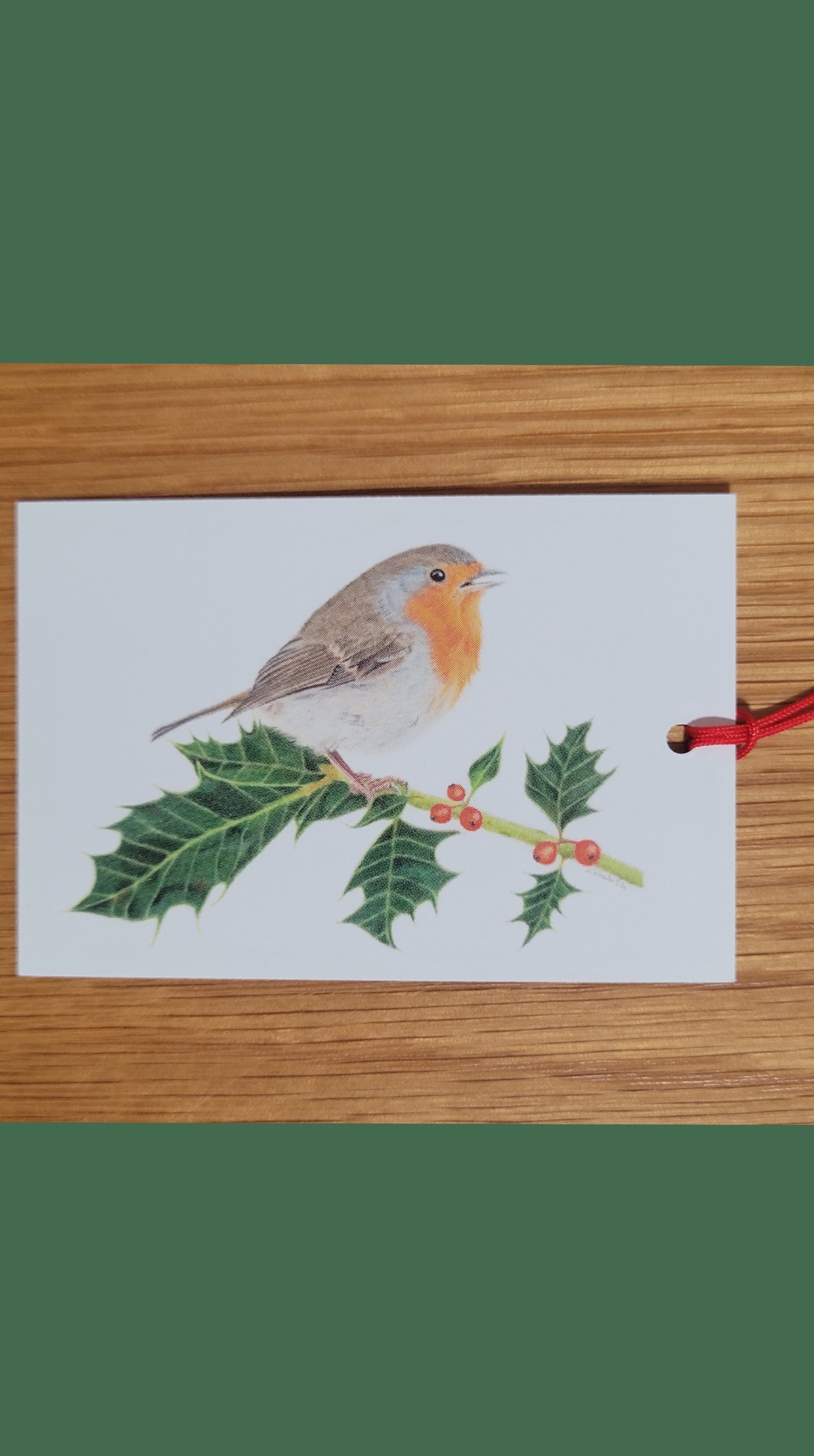 Robin on holly gift tags.