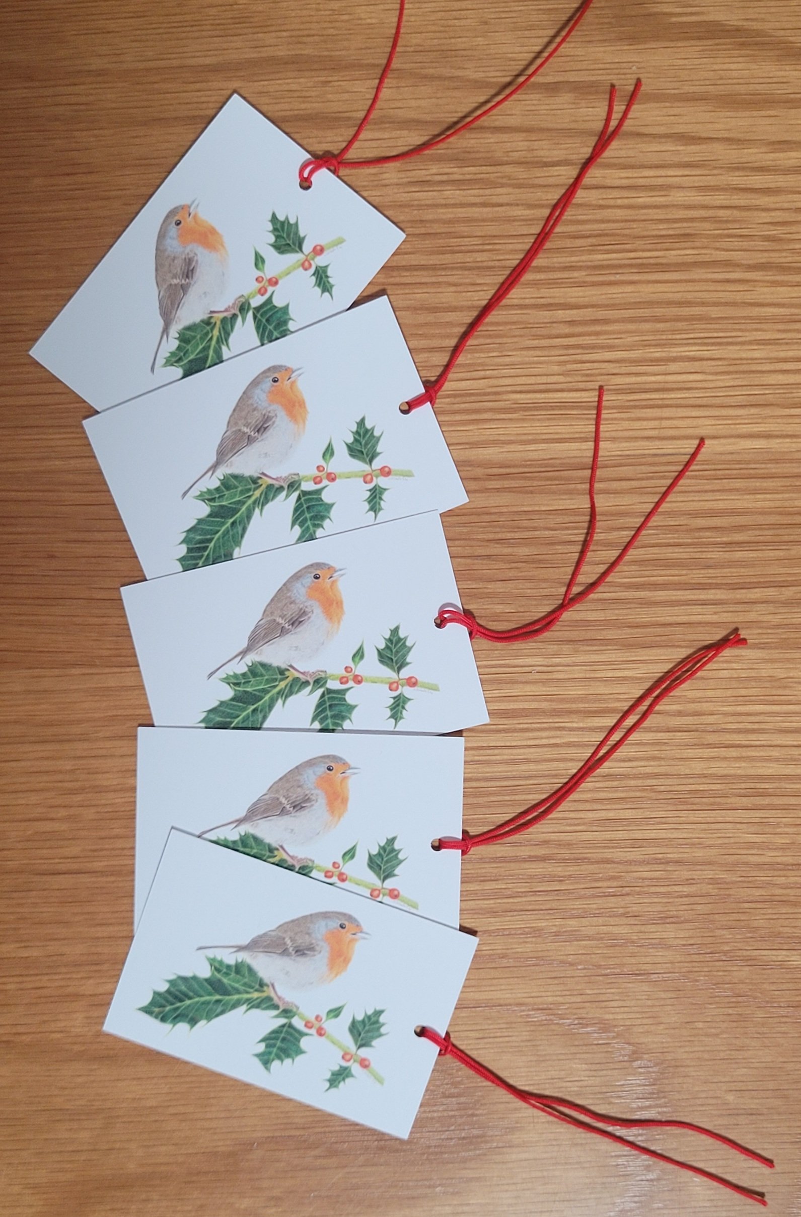 Robin on holly gift tags.