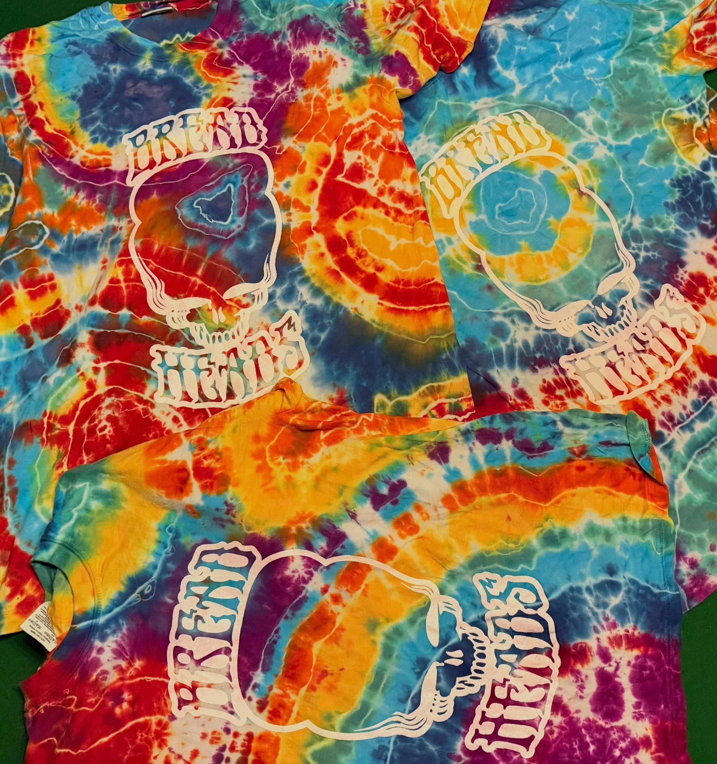 Bold colors. Good vibes. Zero apologies.

Our latest Breadheads tie-dyes are a full-spectrum explosion of color featuring the iconic Breadheads stealie logo front and center. Hand-dyed, one-of-a-kind, and made to celebrate individuality, community, a