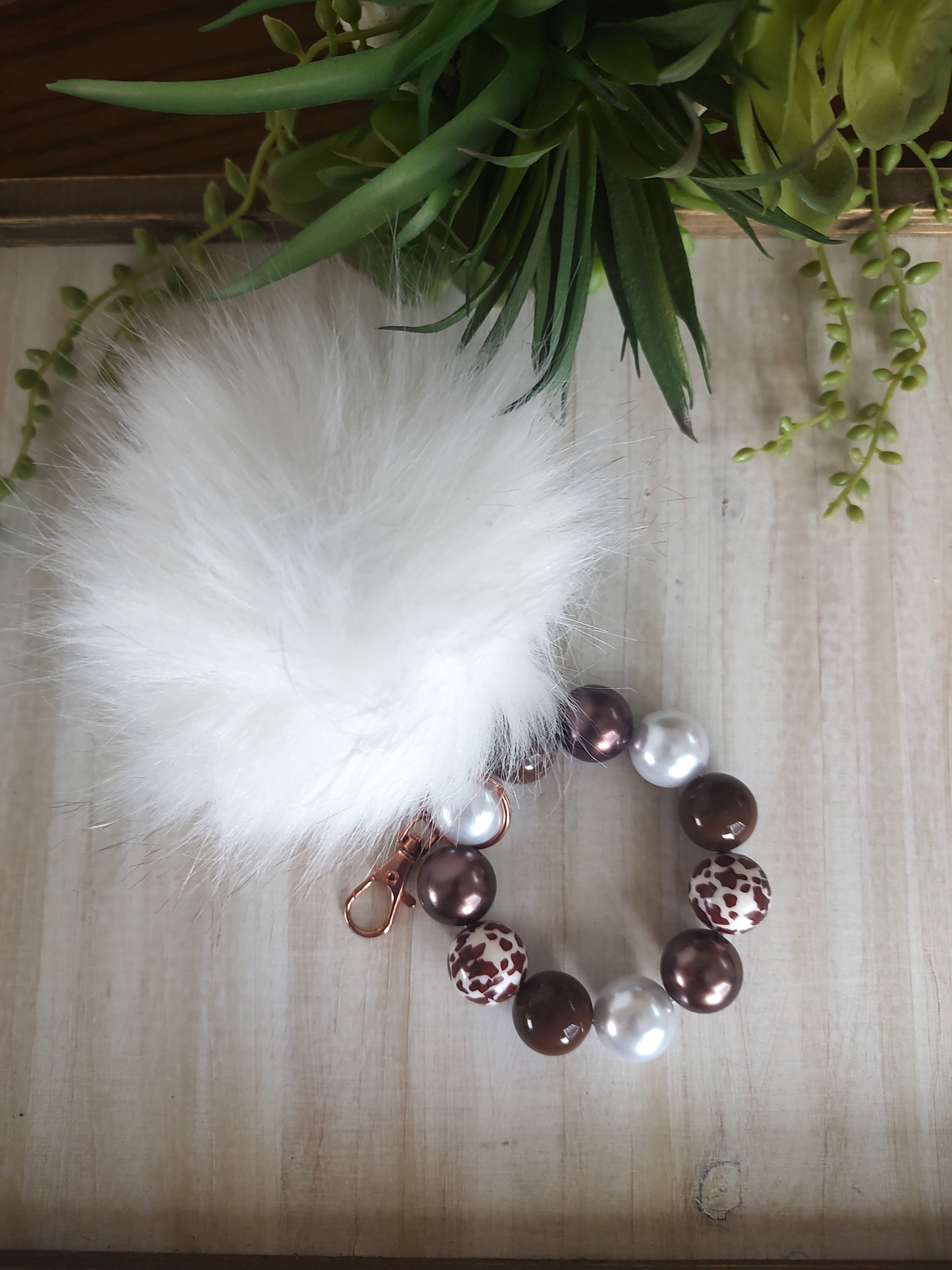 Pom-Pom-Wristlet-White.jpg