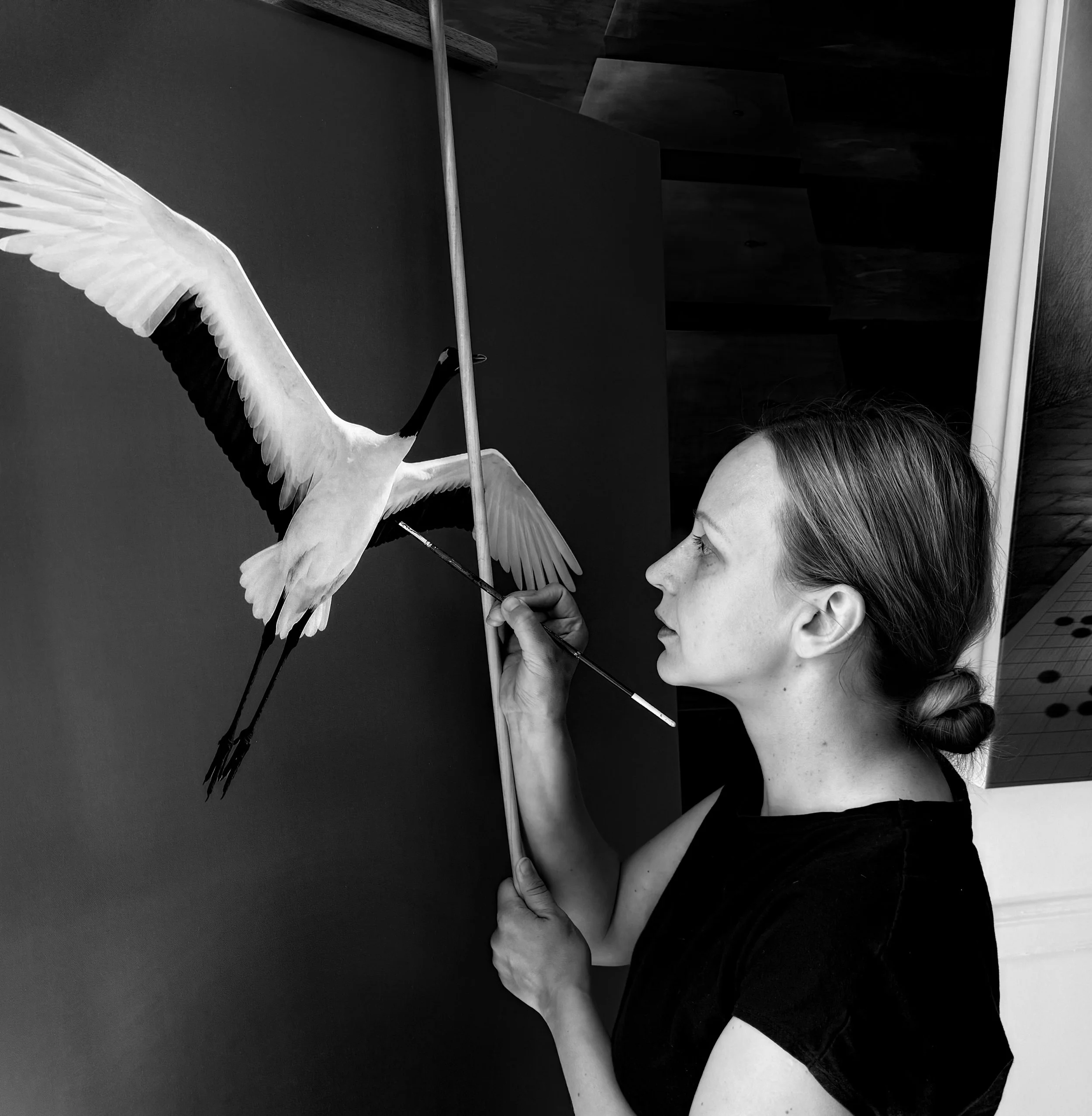 Anna Vital in her studio while working on Last Move painting from her upcoming Black to Move exhibition.