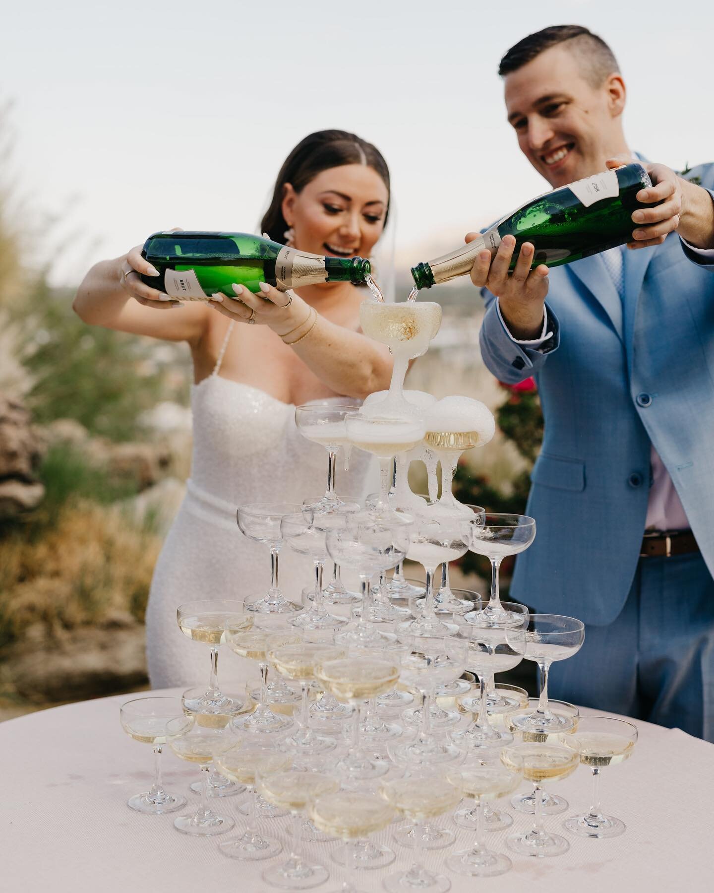 Down the aisle as husband &amp; wife, straight to a champagne tower toast with their loved ones 🥂 So many to share from Sarah &amp; Bret&rsquo;s day 💘