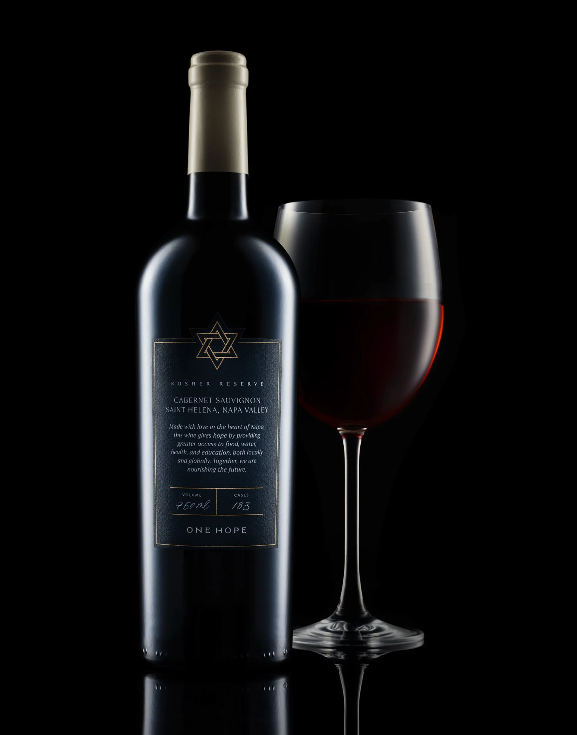 Kosher Reserve Cabernet Sauvignon wine bottle and glass, moody luxury vineyard photography, dark low-key beverage branding, professional red wine product shot, elegant hospitality advertising imagery.