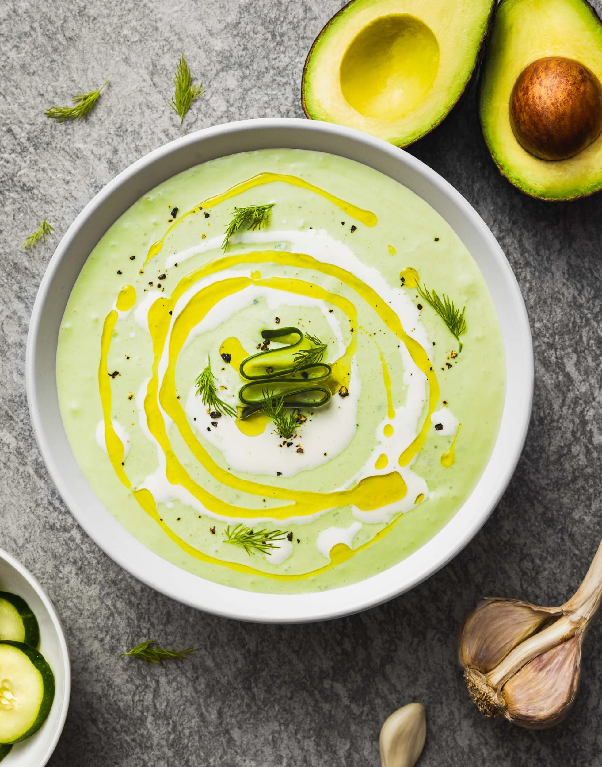 Green goddess gazpacho flatlay photography, professional healthy food branding, overhead vegan soup styling, vibrant plant-based culinary photography, editorial fresh produce imagery for menu design.