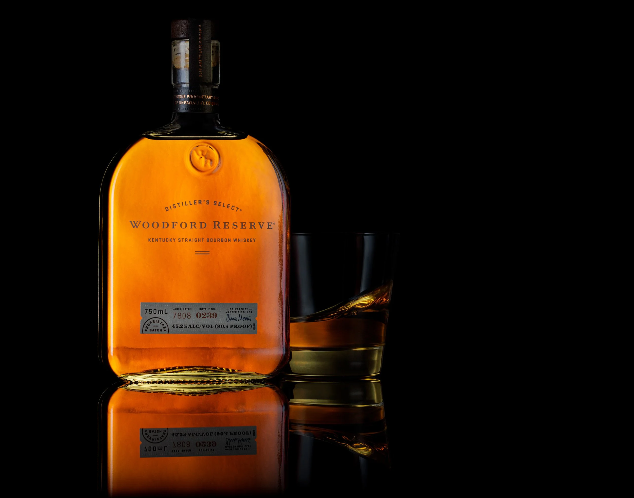 Woodford Reserve bourbon commercial photography, creative whiskey product branding, luxury spirits advertising shot, professional beverage photographer, moody drink styling for social media marketing.