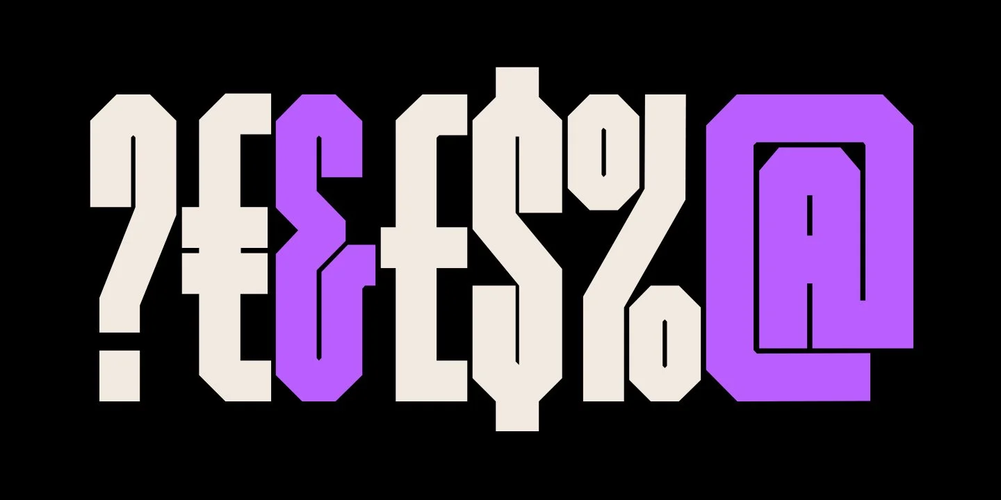 Stylized colorful text that reads 'YESQUE' with a black background.