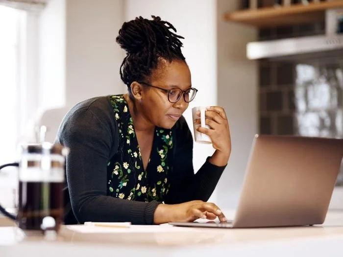 Woman reading the blog of The Brands And Bands Strategy Group