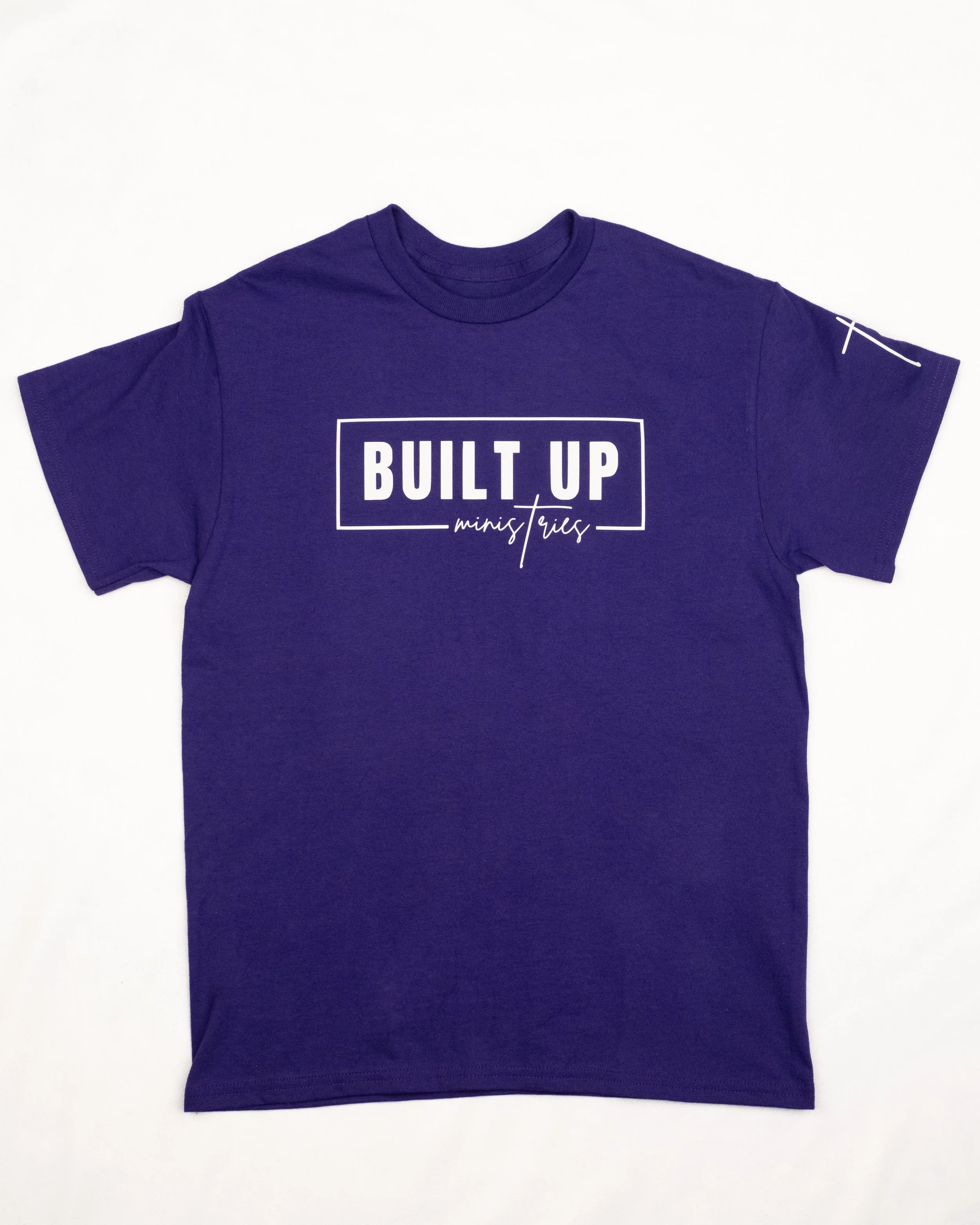 Purple short-sleeve t-shirt featuring the white Built Up Ministries logo on the front.