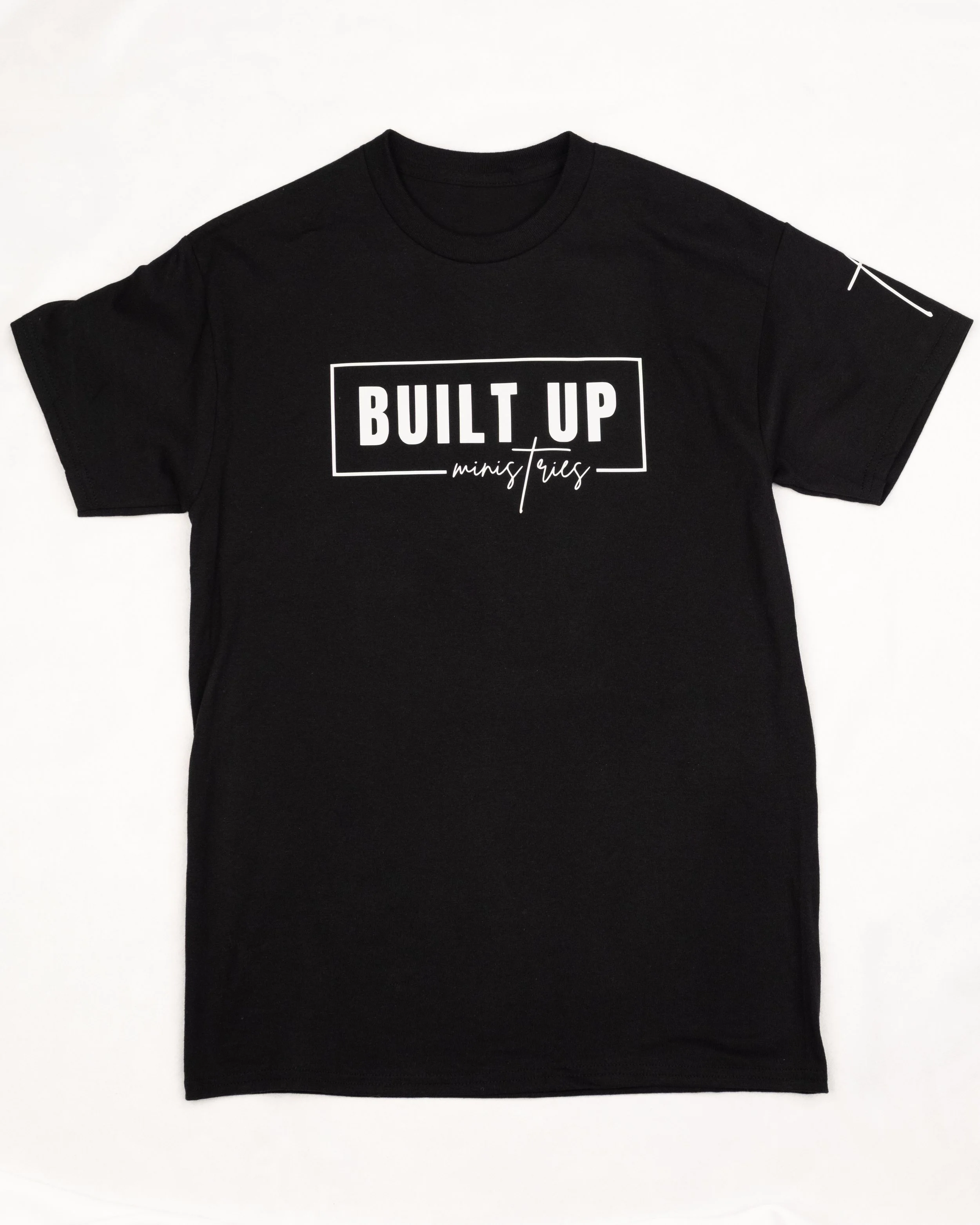 Black short-sleeve t-shirt featuring the white Built Up Ministries logo on the front.