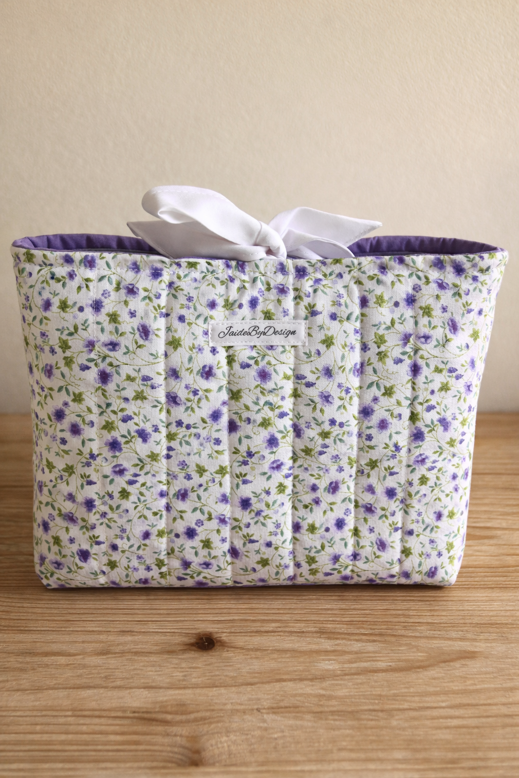 Handcrafted purple floral quilted Bible sleeve by JaideByDesign for Built Up Ministries fundraiser