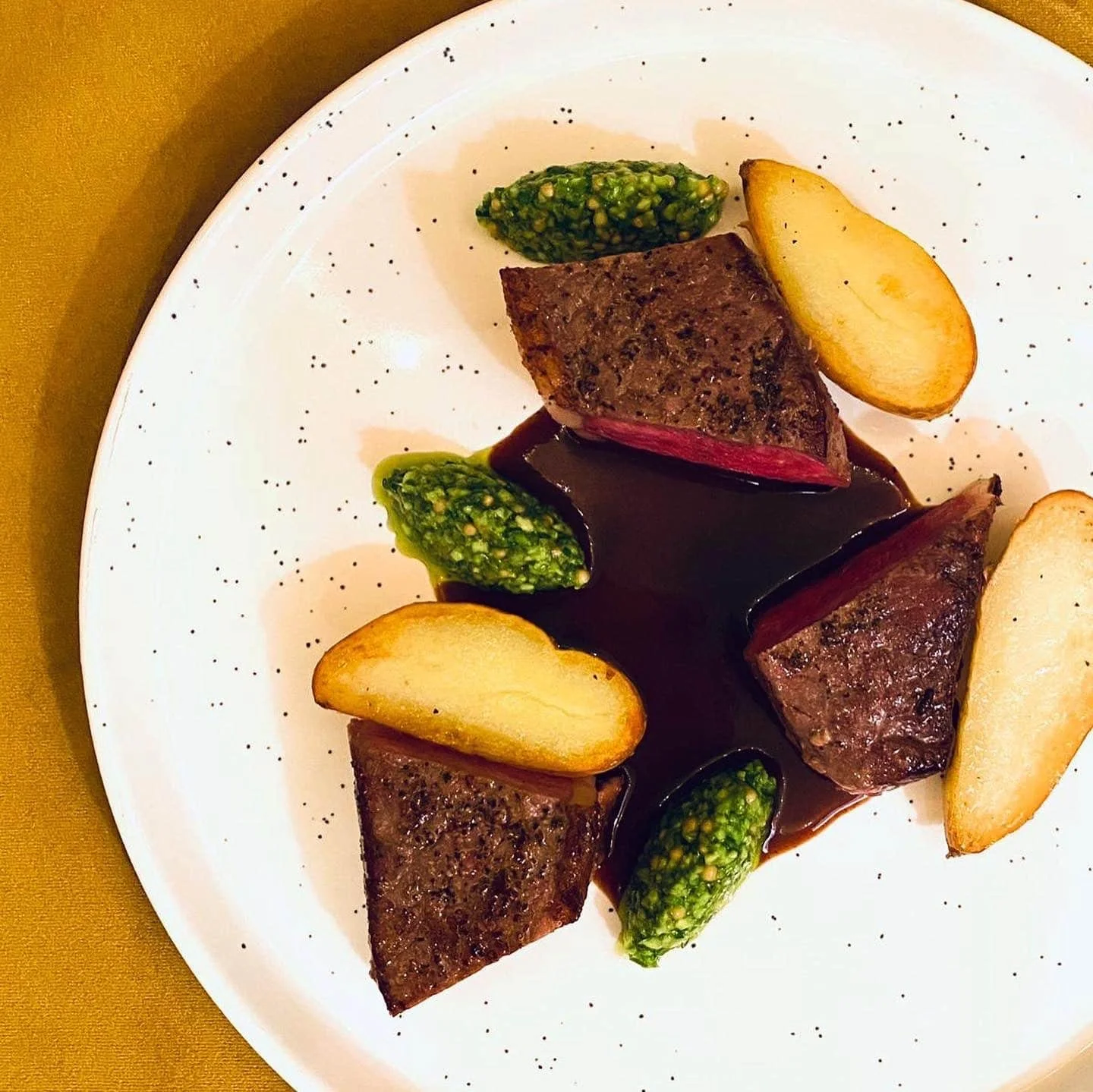 Individually plated NY strip steak in Calistoga