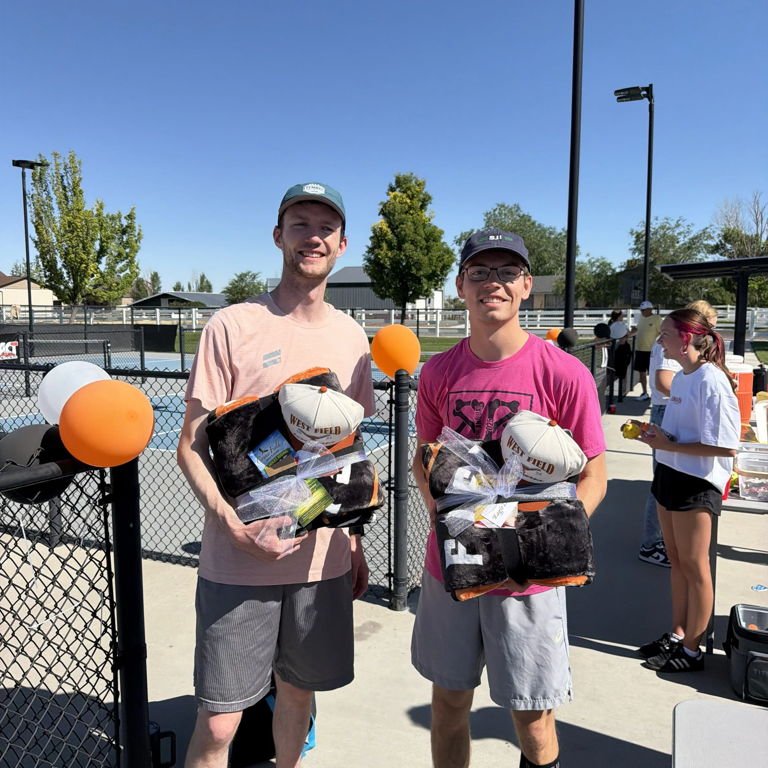 What a blast supporting the West Field High School Cheer Team fundraiser! Adam Naser and Logan Ward represented our team well, taking home the win at the pickleball tournament. 

It was a great event for a great cause. So proud to cheer on these stud