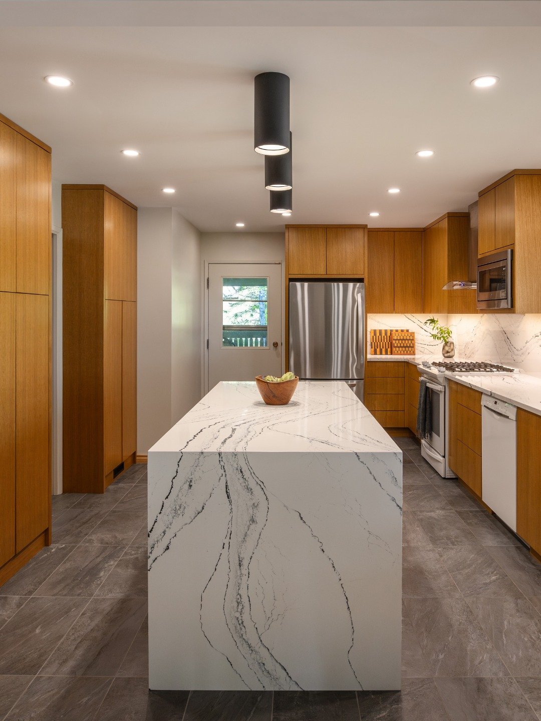 Kitchen glow up incoming!

Here's a before and after of this kitchen transformation focused on opening the space to the living area and introducing clean mid-century modern lines to complement the clients&rsquo; existing vintage Scandinavian furnitur