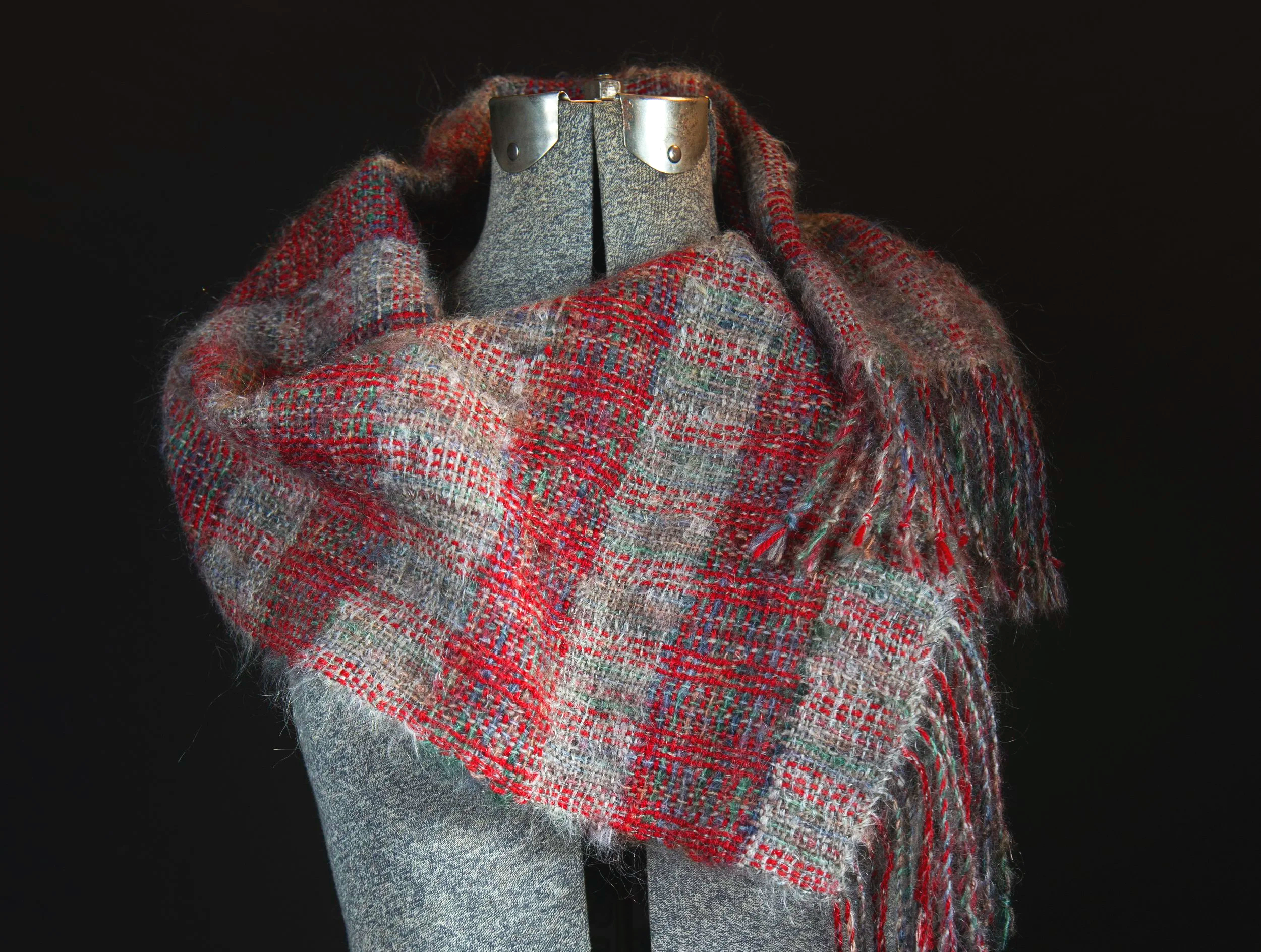 woven wool cloth with vibrant colors using a rigid heddle loom