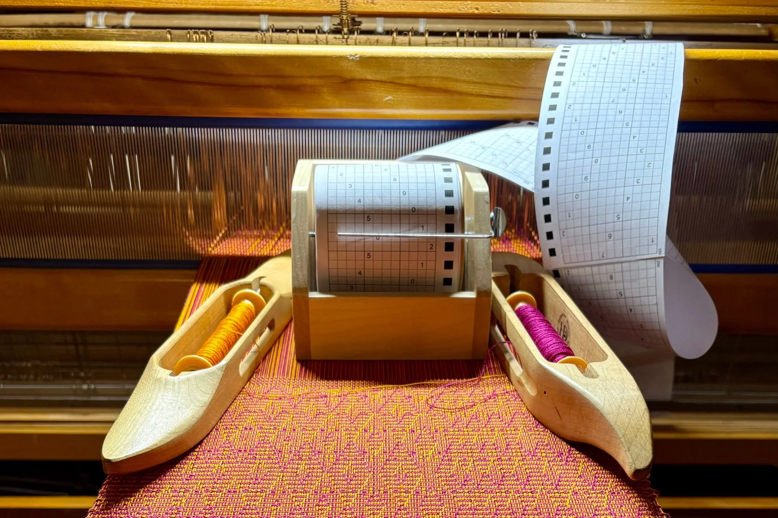 woven cloth and shuttle