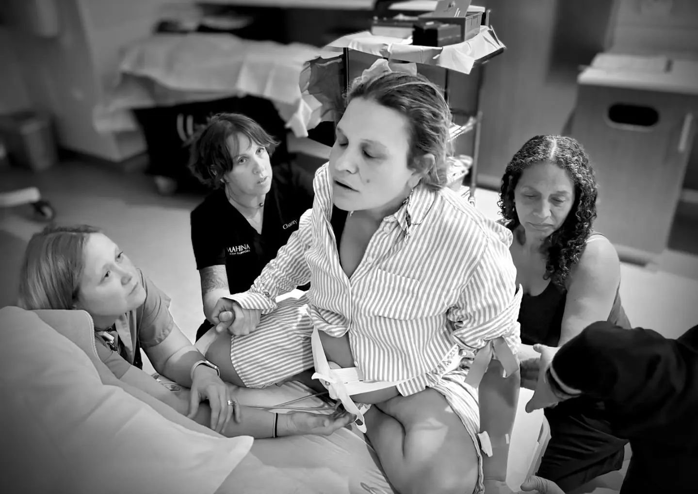 This amazing client wanted a birth surrounded by strong women and she absolutely achieved that goal! She was surrounded by her wife, her mom, her friend, her doula, her midwife, and her nurse. It was absolutely beautiful to be a part of.

This photo 