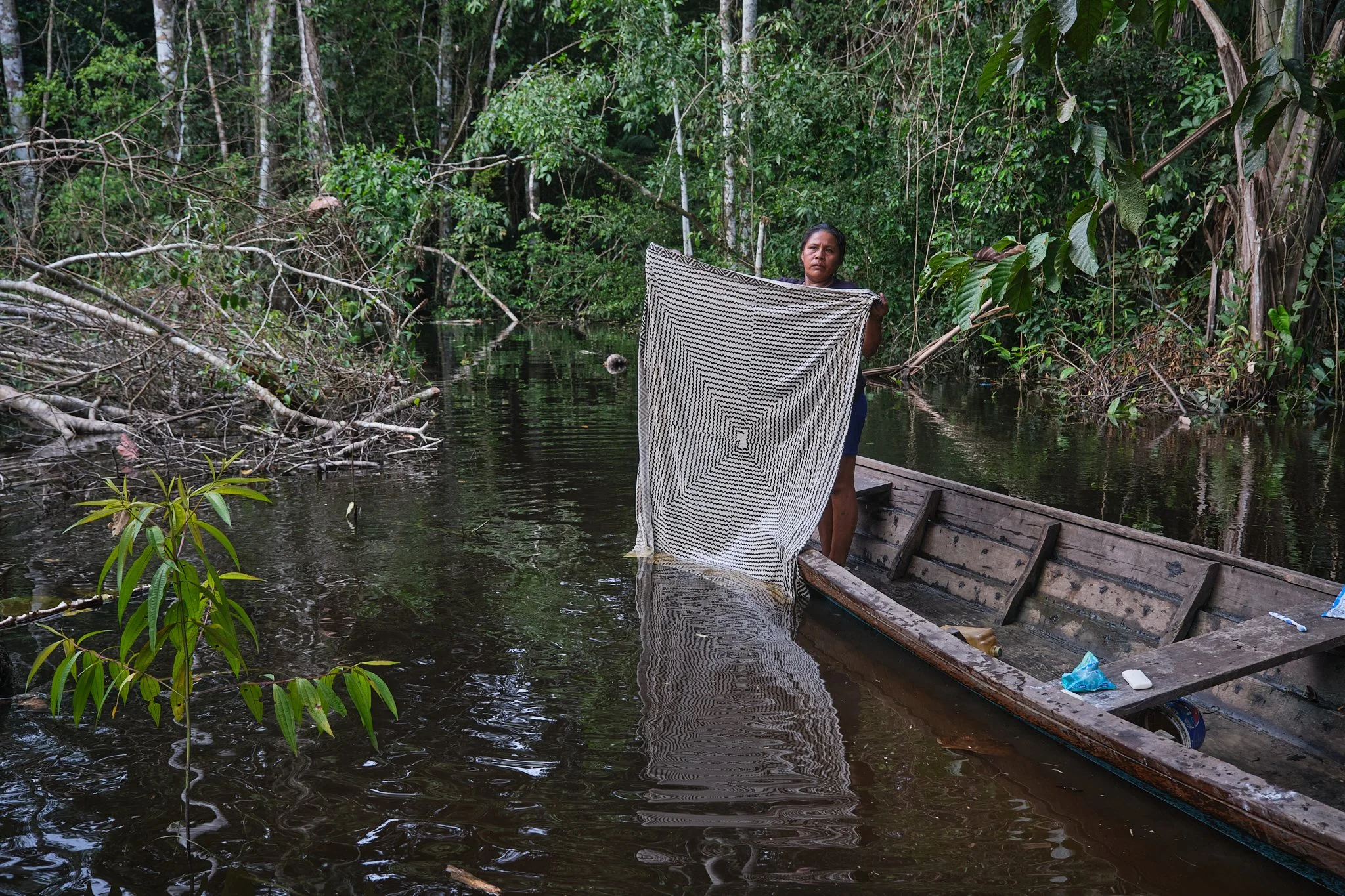 washing blanket in river.jpg
