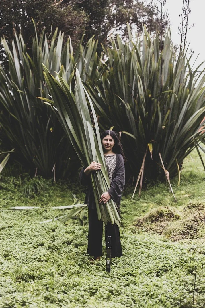 artist carrying palms.jpg