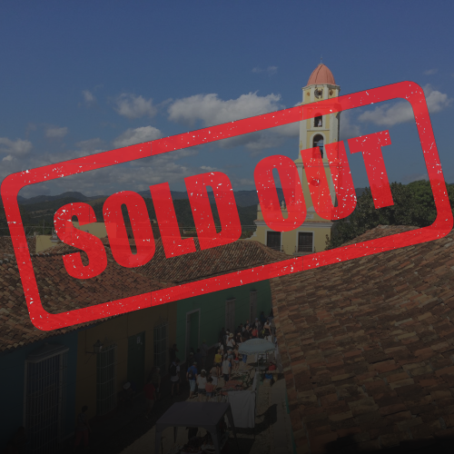Trinidad, Cuba skyline with a church tower and street market, "SOLD OUT" stamp overlay.