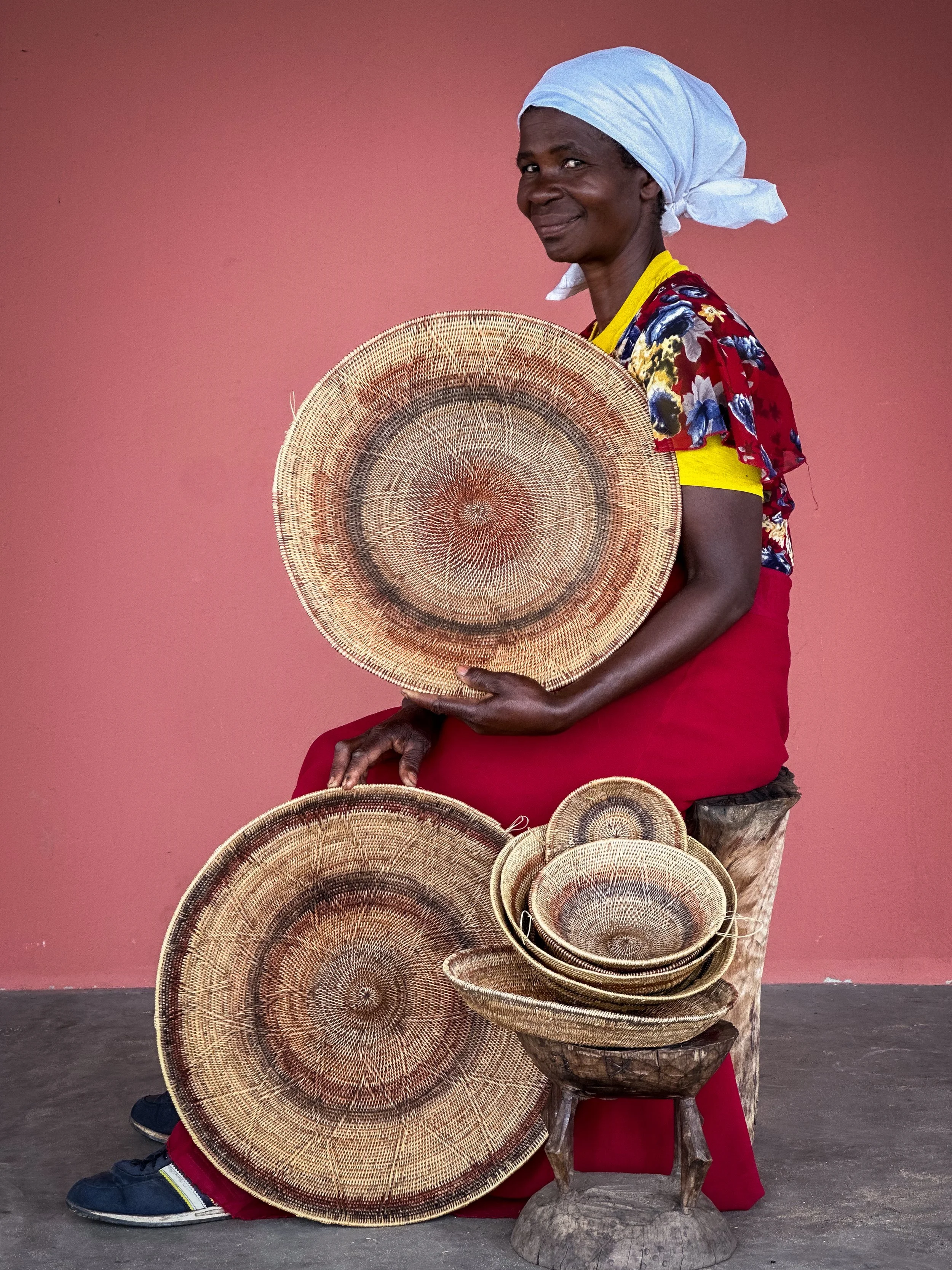artist with baskets